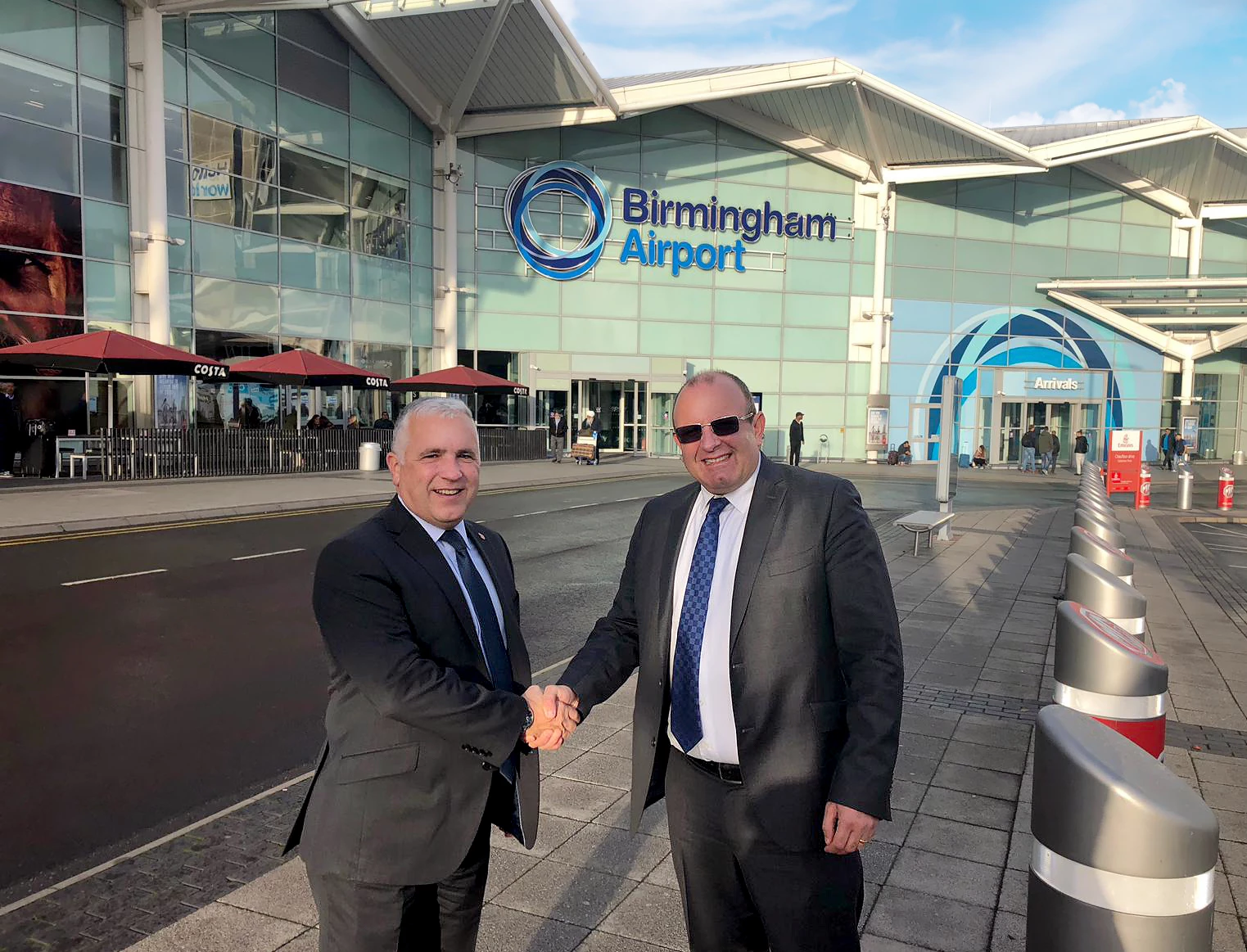 Birmingham Airport's Richard Gill (left) and Arrow Cars chairman David Richmond