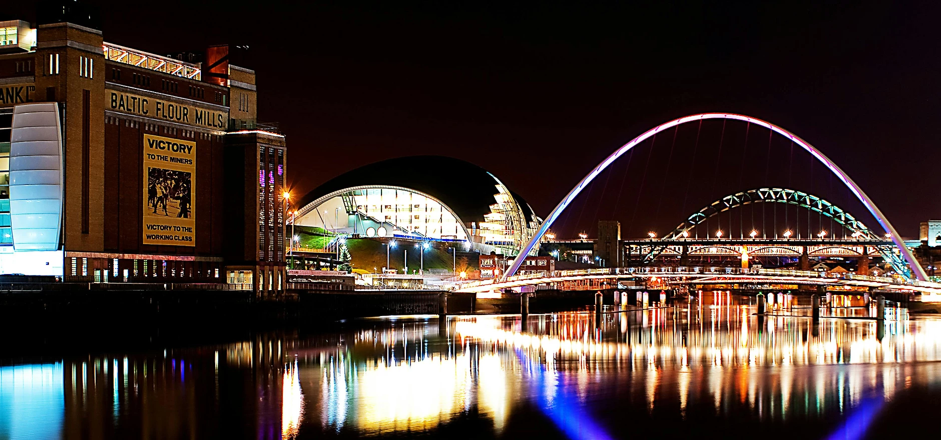 Building Beside Bridge at Night