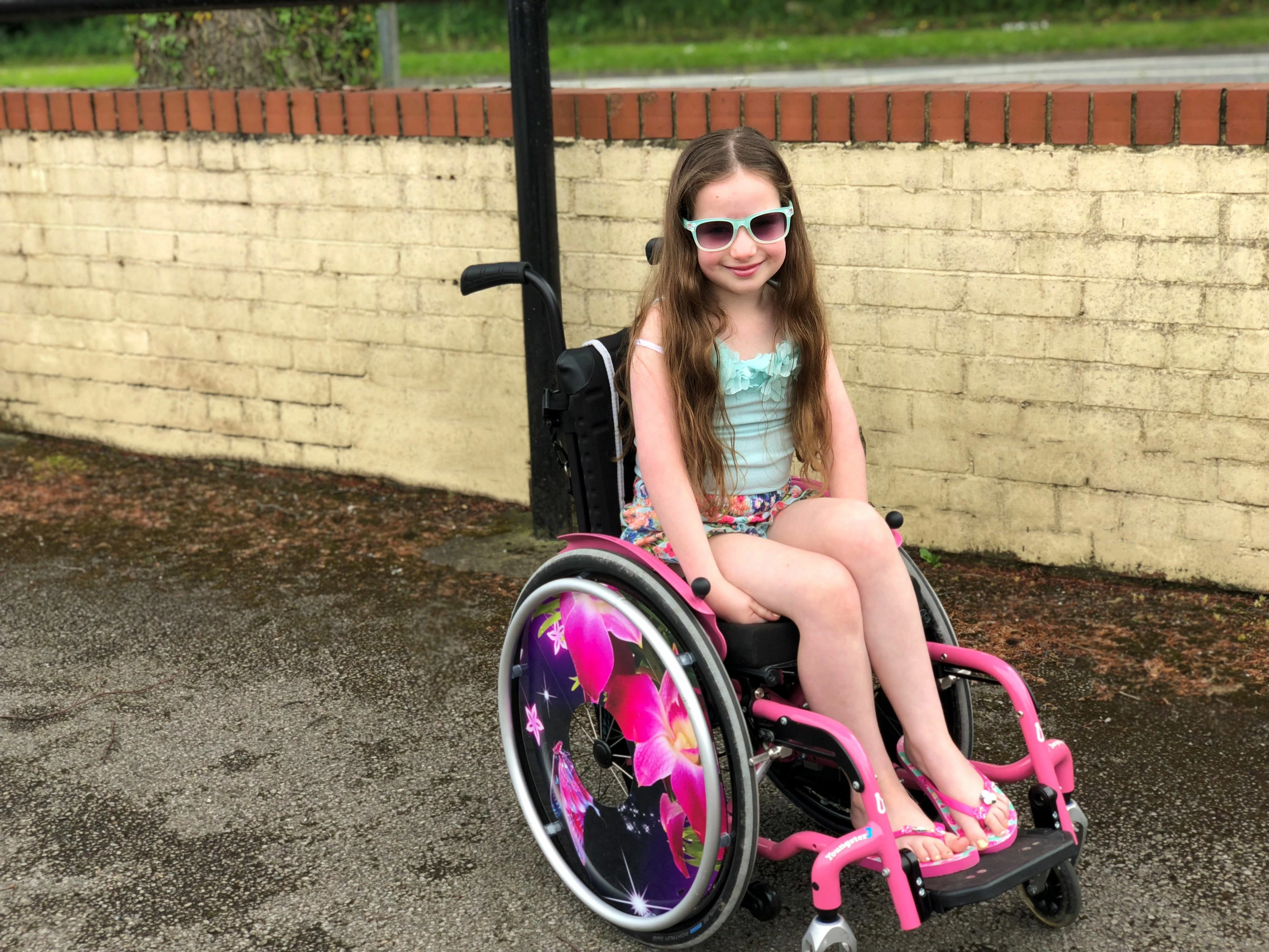 Amelia in her new wheelchair