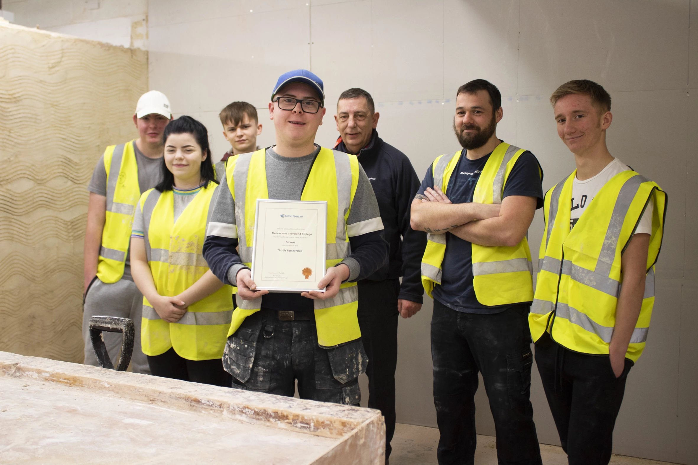 Redcar and Cleveland College Plastering students with lecturer Richard Cochrane