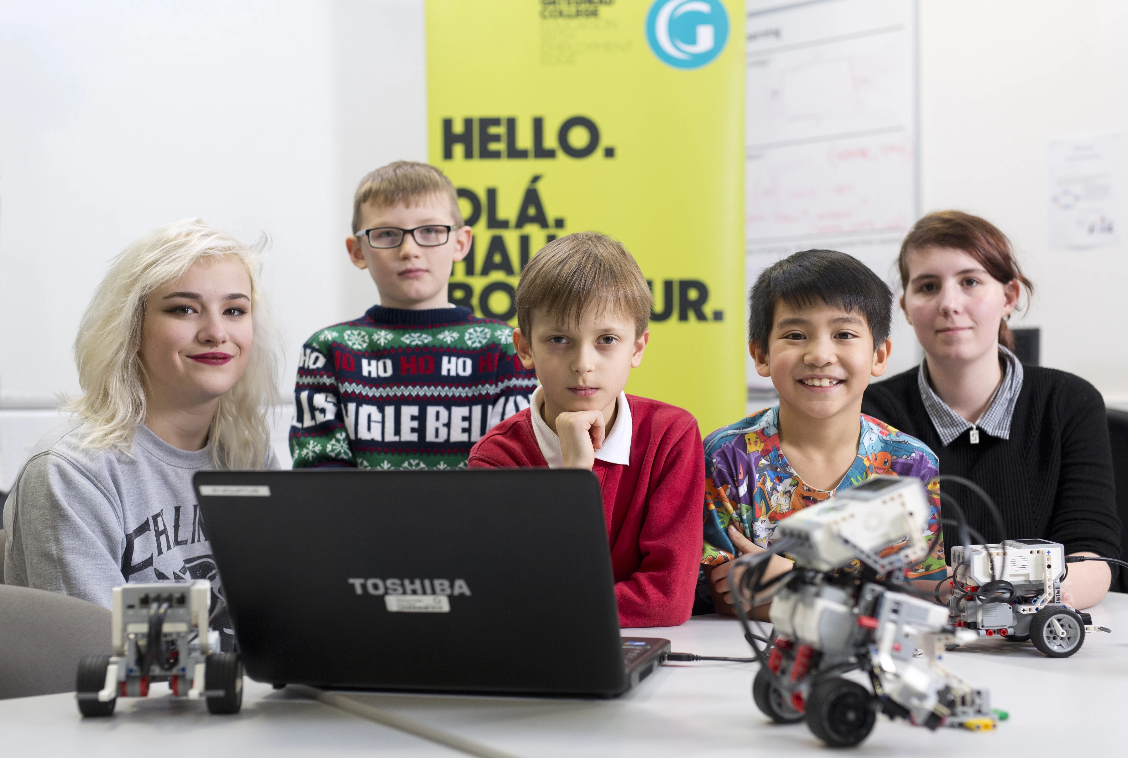 L-R Gateshead College BTEC Computing student Kelsey Andrews , Bede Primary School students Wayne Dale, Oliver Nieznanski, Kaiser Tanedo, and Gateshead College BTEC Computing student Rhian Lukins.