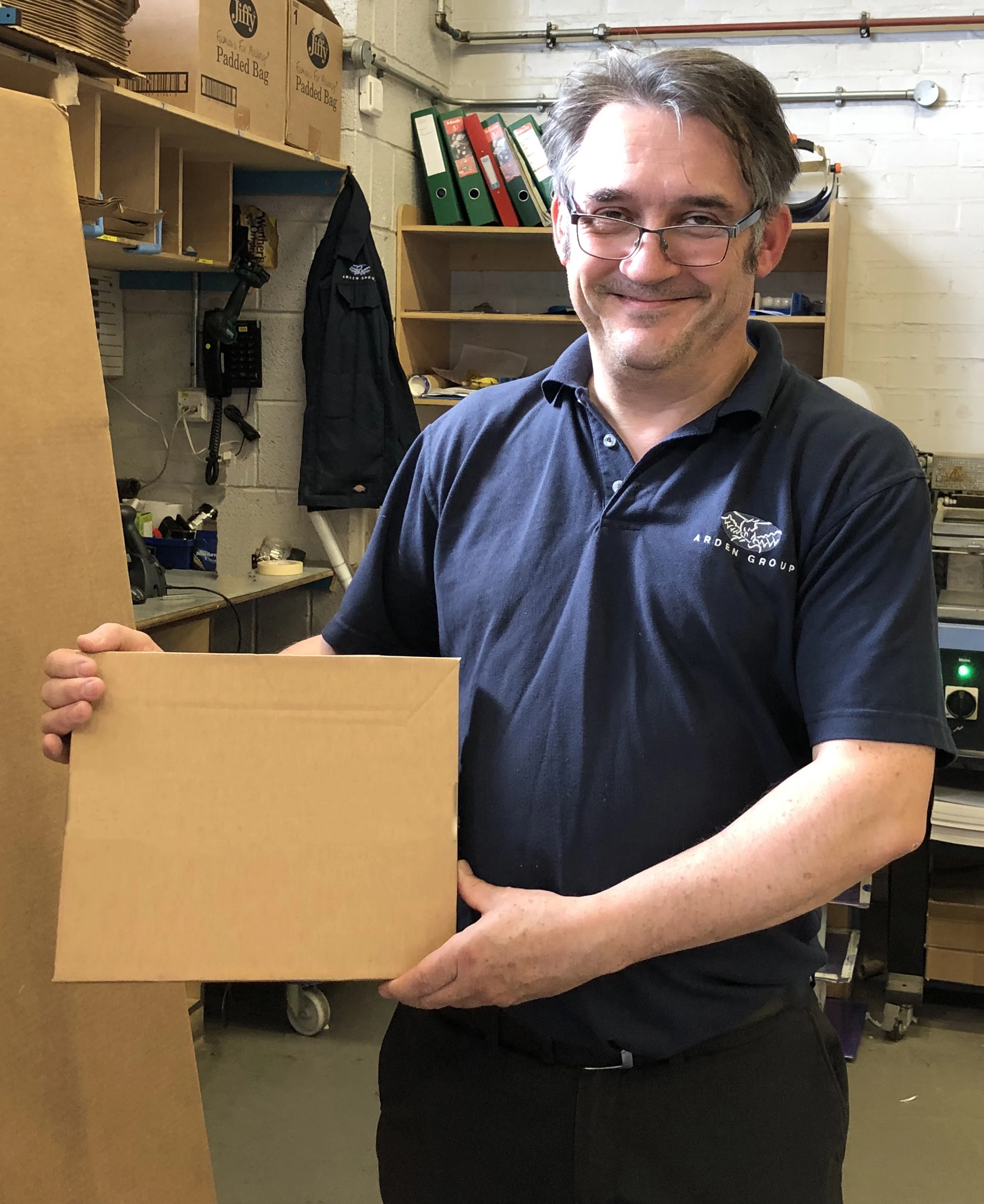 JP Brooks, Technical Sales Manager at Arden Dies with the cardboard packaging that is now used for all external packaging