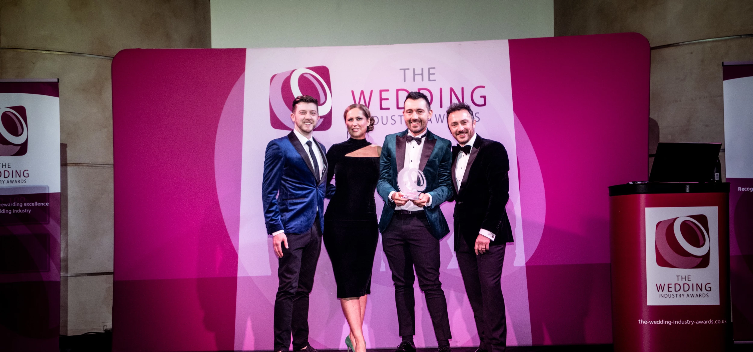 Ellingham Hall's Anthony Hunter, Lynn Sanderson and David Fordham-Scott collect the award from a TWIA representative