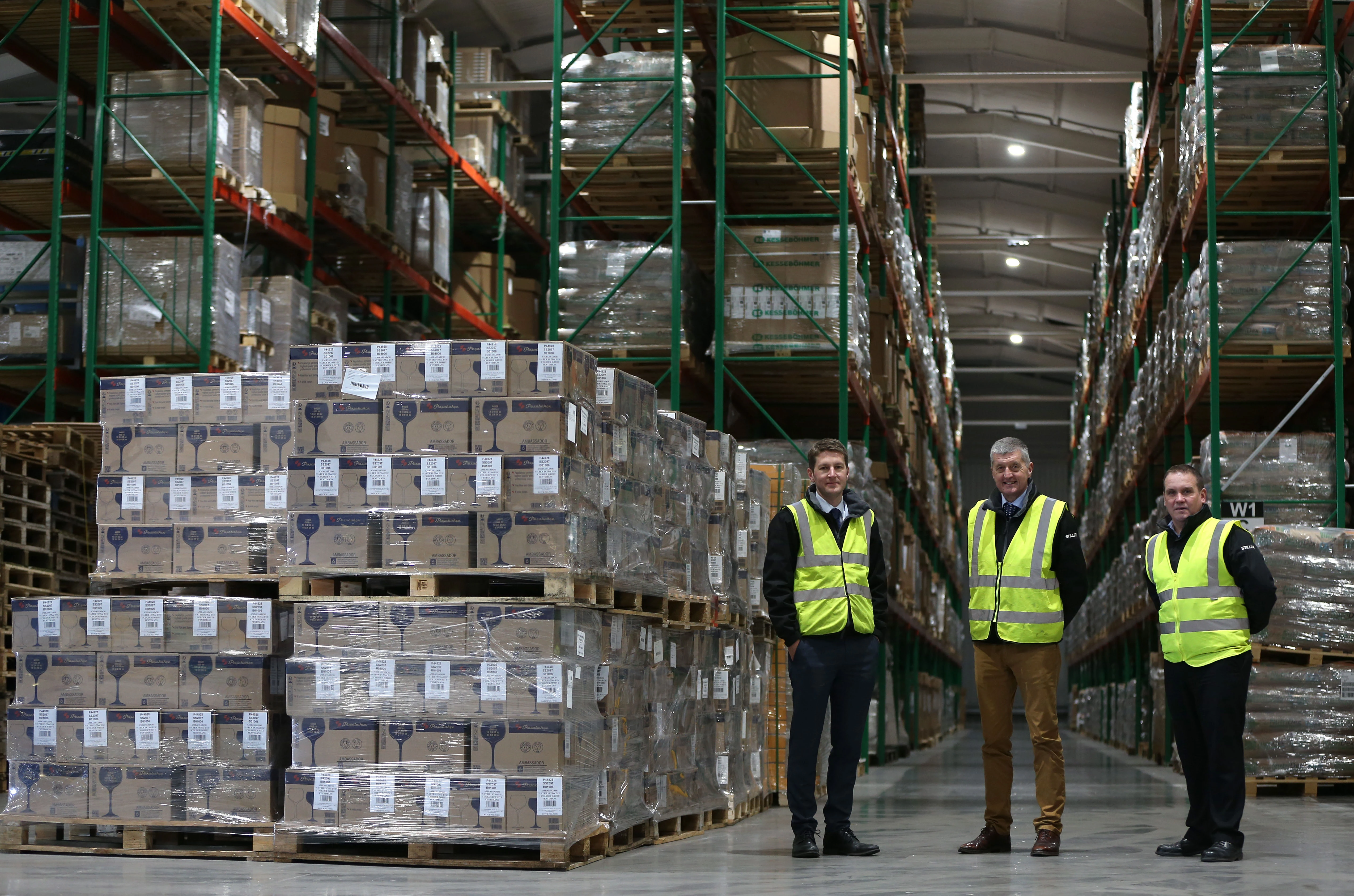 MD Matthew Stiller (left) and his father Paul with warehouse manager Gary Auston