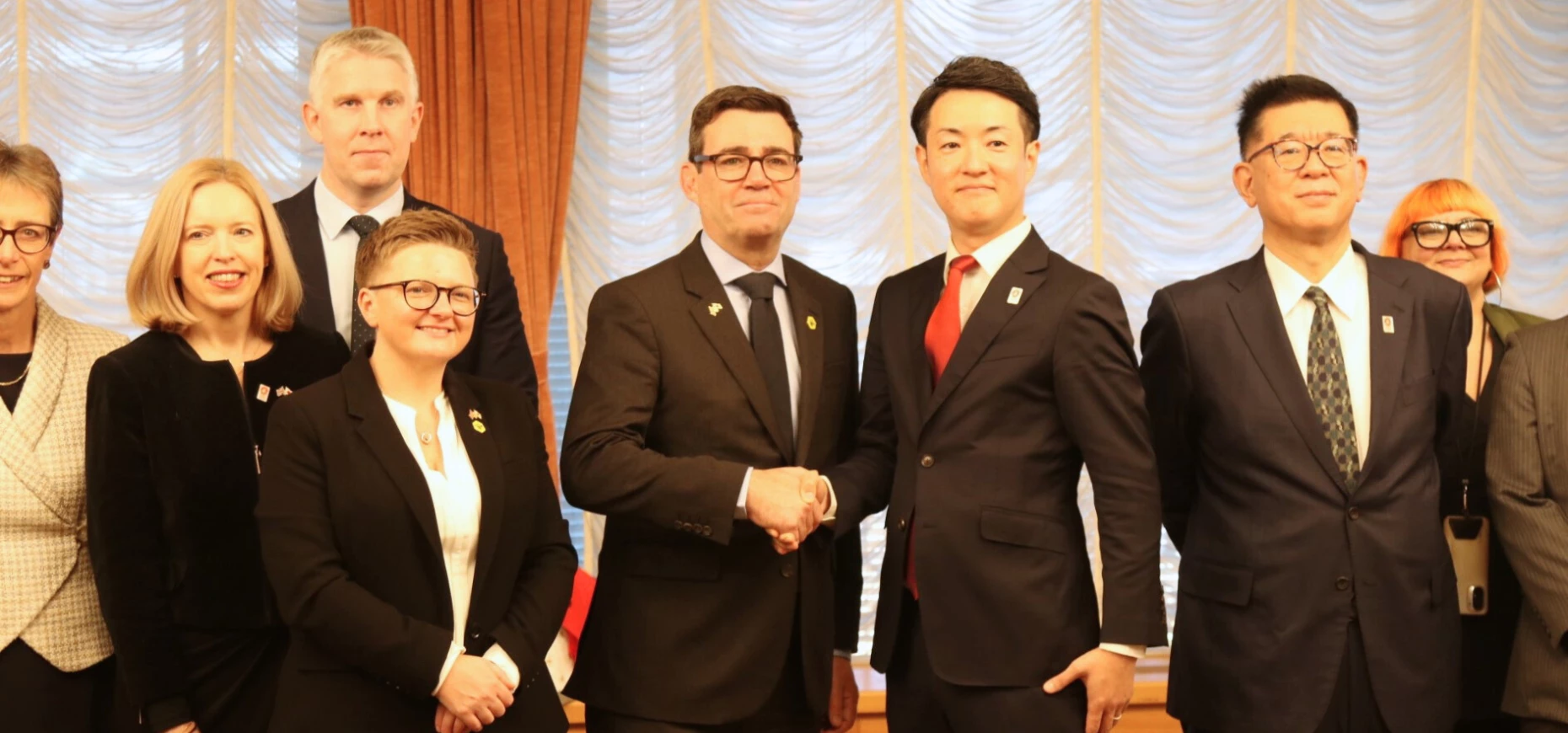 Mayor of Greater Manchester Andy Burnham and Cllr Bev Craig, Leader of Manchester City Council and Greater Manchester Economy Lead, mark the signing of the new agreement with Hideyuki Yokoyama, Mayor of Osaka. 