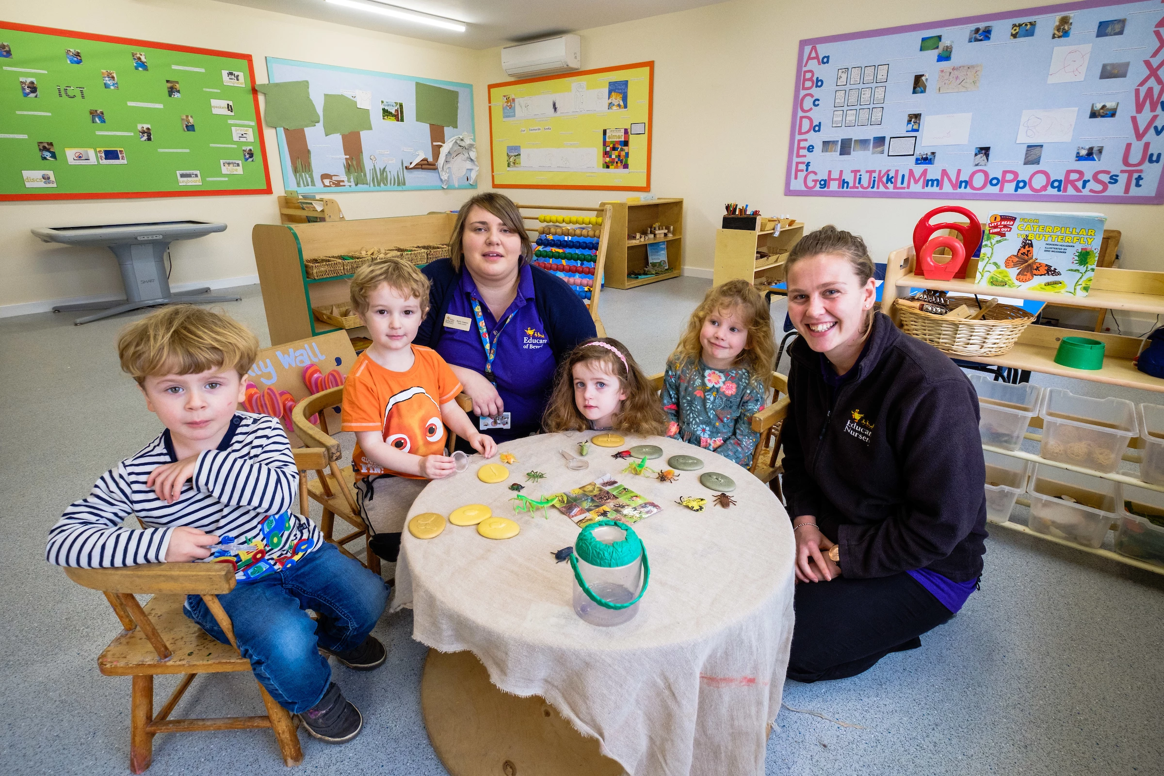 Educare’s Becky Dawson (centre) with nursery nurse Abbie Wilson and some of the youngsters in the new extension