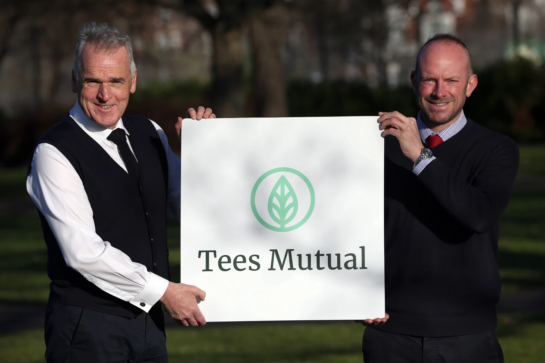 Chief executive Phil Carey and vice chair Jamie Brown with the new Tees Mutual logo