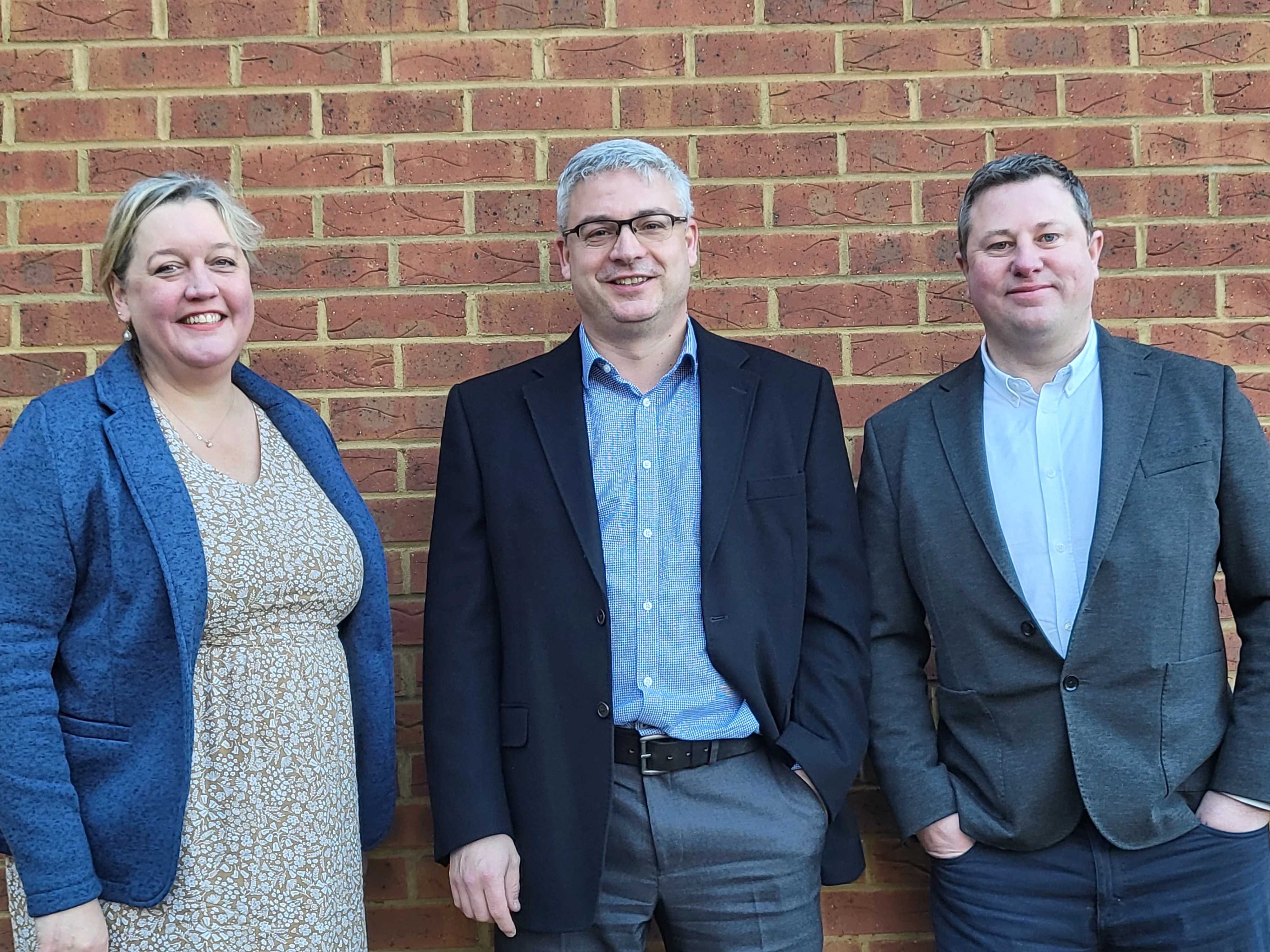 L-R: Sarah Fitzgerald, Carpenter Box Partner, David Knight and Peter Reading outside the new Chichester Office.