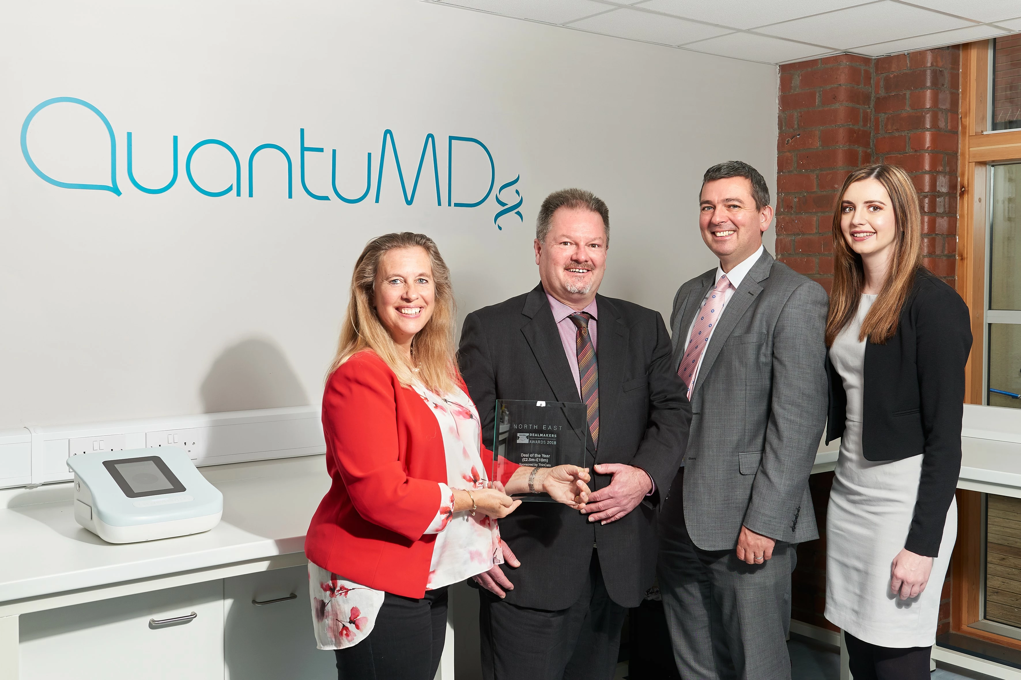 L-R: QuantuMDx co-founder Elaine Warburton and corporate secretary Norman D. Kribs with Watson Burton’s Duncan Reid and Kirsty Adamson