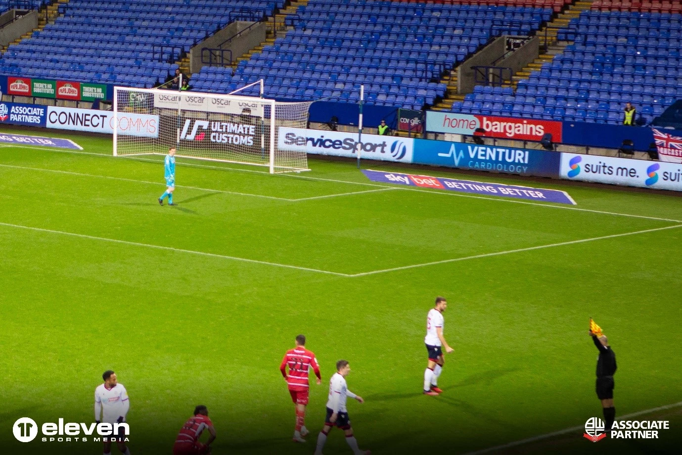 ServiceSport UK branding appears throughout Bolton Wanderers' stadium