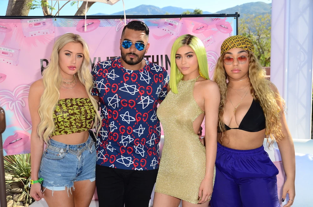 Umar Kamani, with social media stars (L-R) Stassie, Kylie Jenner and Jordyn Woods