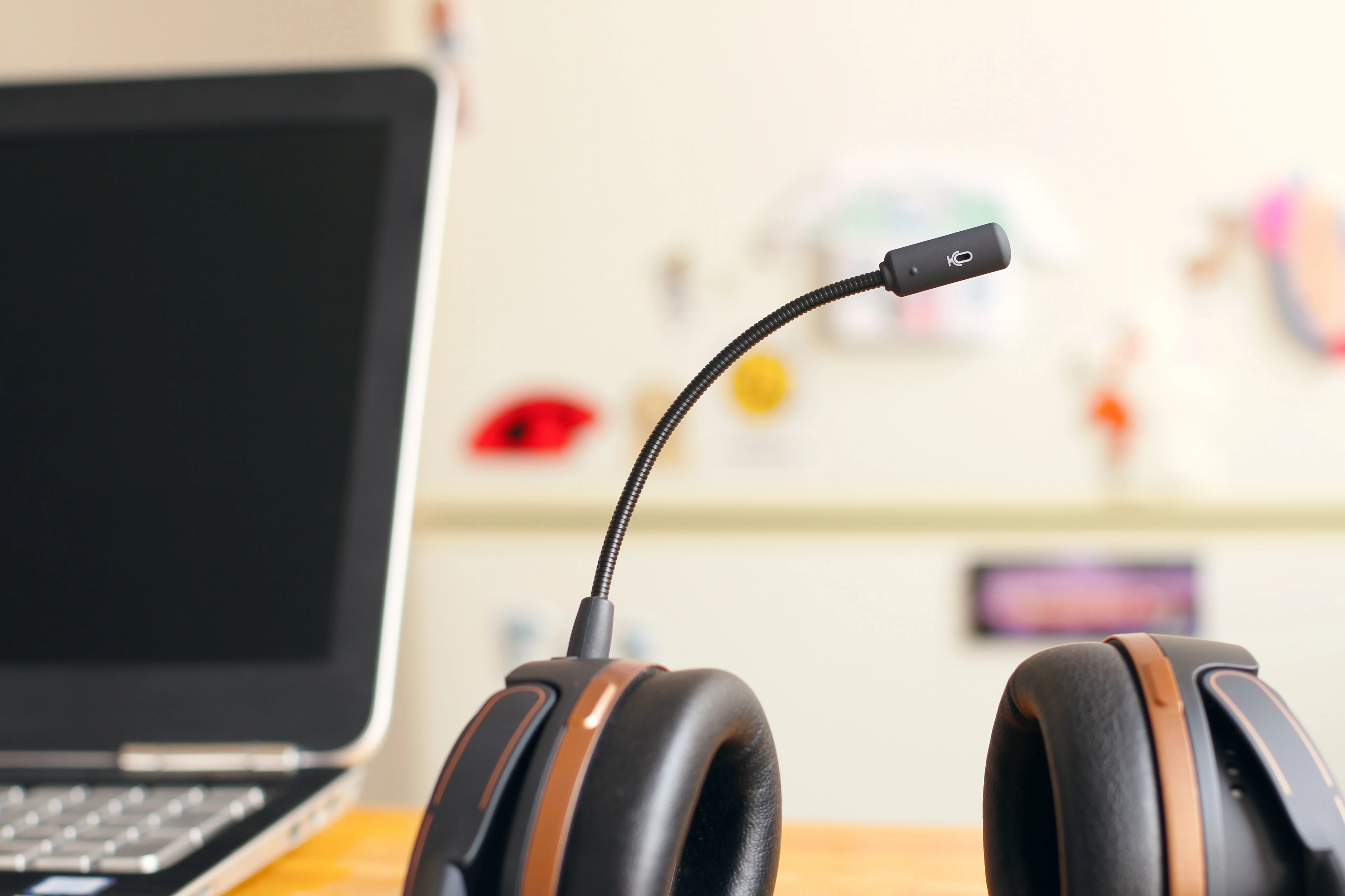 A telecommunications headset on a table. 