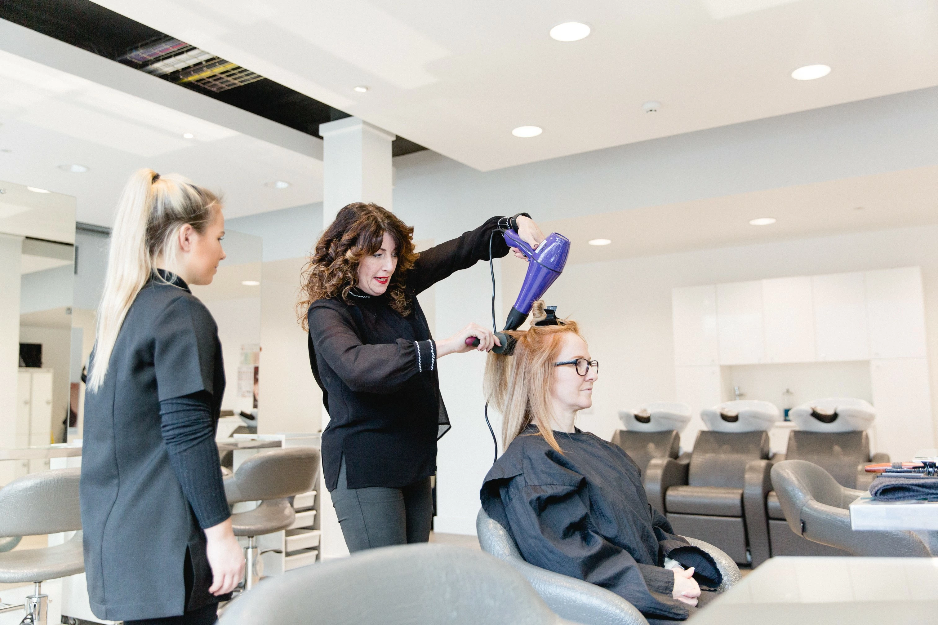 Hairdressing students at Harrogate College. Please note, this photo was taken before the Covid-19 pandemic.