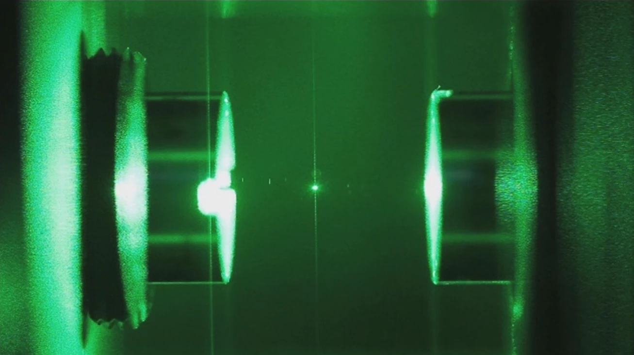 Glass nanoparticle suspended in an optical cavity