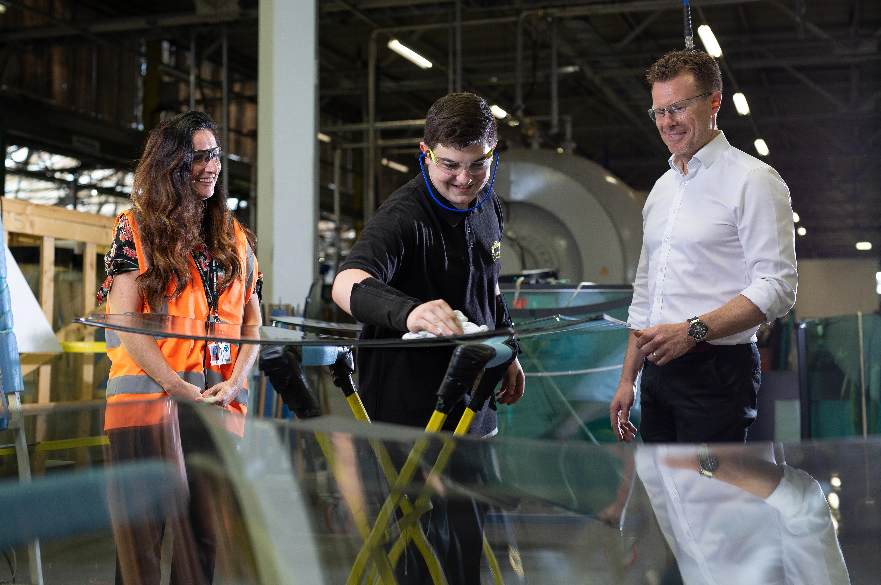 L-R: Lianne Marston of Gateshead College, apprentice James Fiddes and Tyneside Safety Glass' Chris Hannant