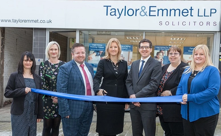 Taylor&Emmet's new Rotherham office is opened by Michaela Heathcote and Neil Riley (fourth and fifth left), alongside their colleagues based at the branch. 