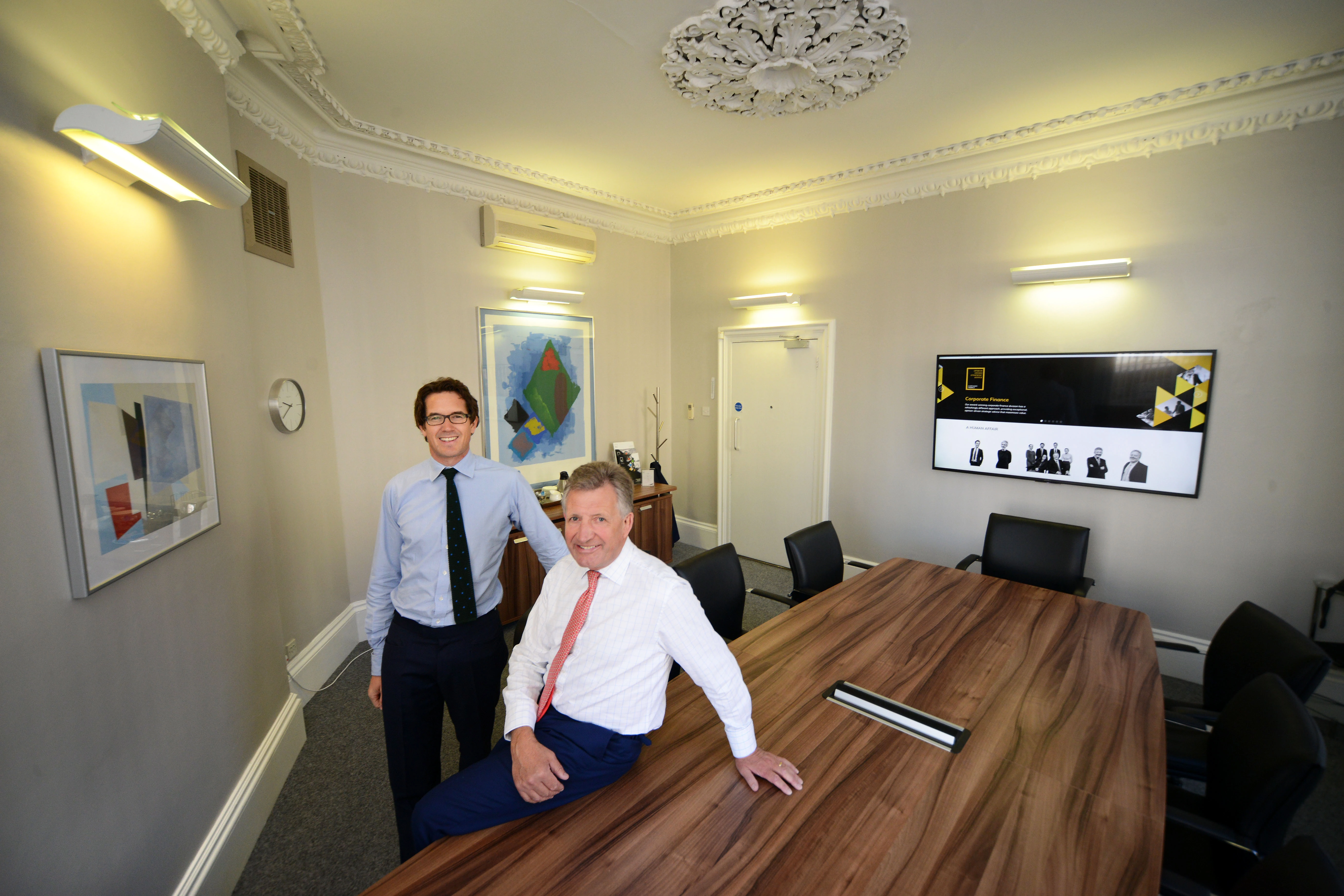 RG Partner Peter Glenton (left) and Managing Partner Chris Robson (right) in one of the refurbished boardrooms at the firm’s Newcastle offices