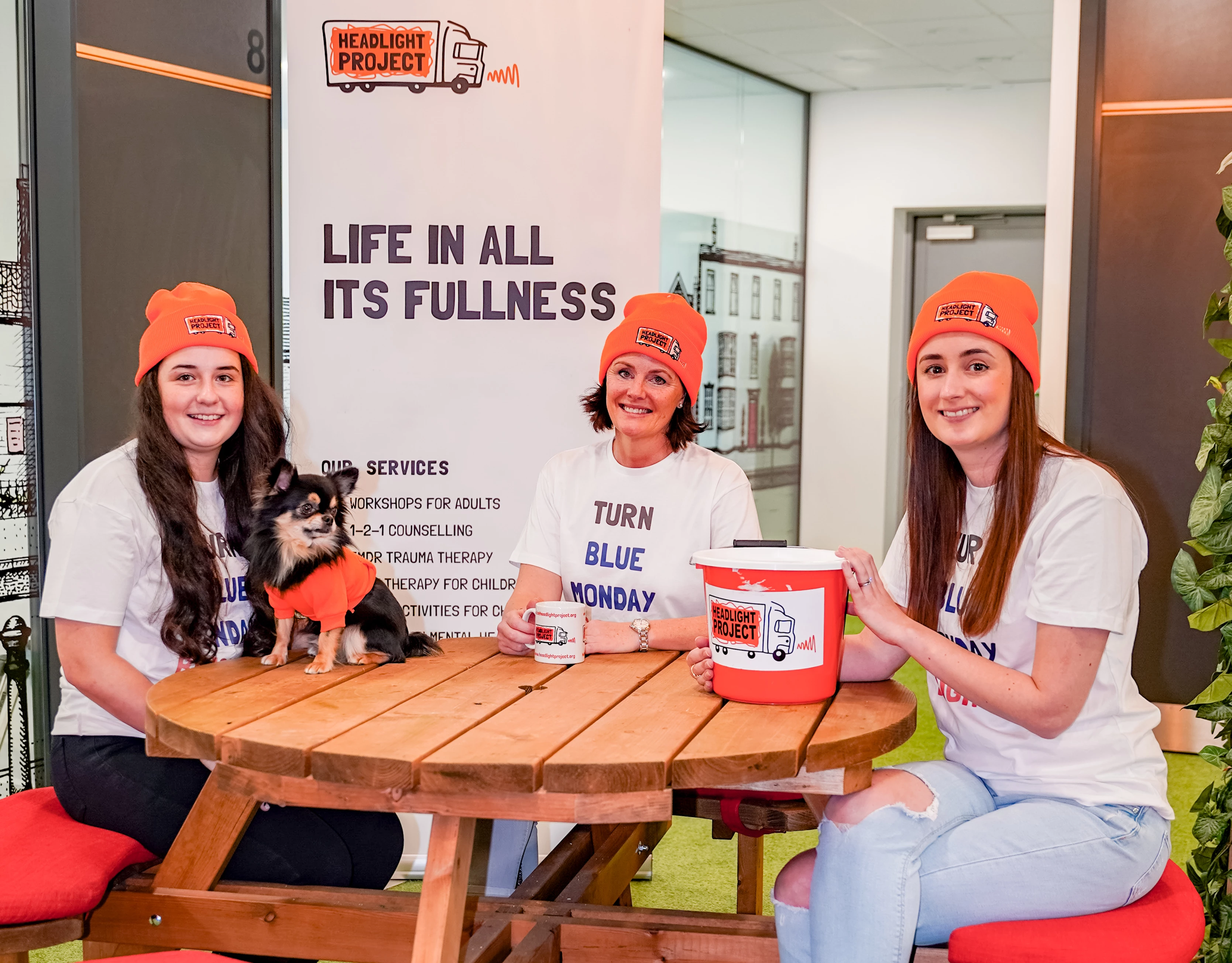 Trainee counsellor & administrator Lucia Yates, Mario the dog, operations manager Suzanne Julian and marketing consultant Karen Parker from the Russ Devereux Headlight Project