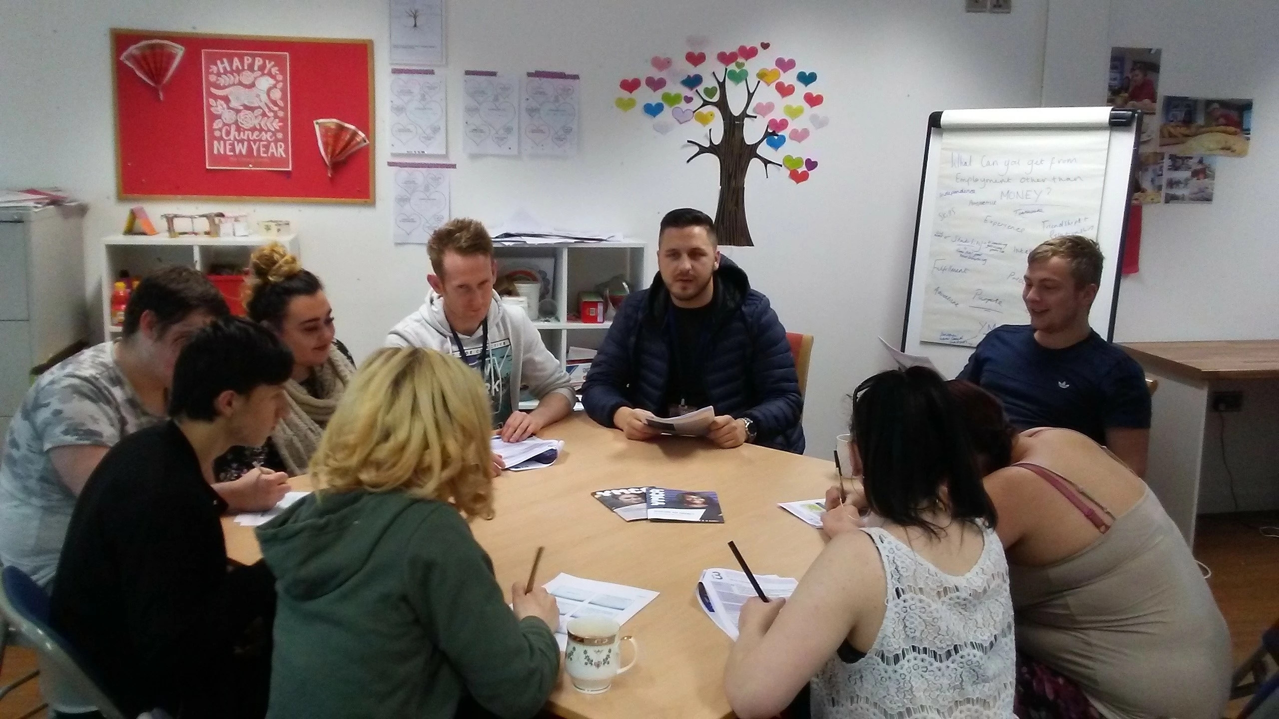 Youth development worker Connor Lonsdale with young people participating in the #Motiv8ed service