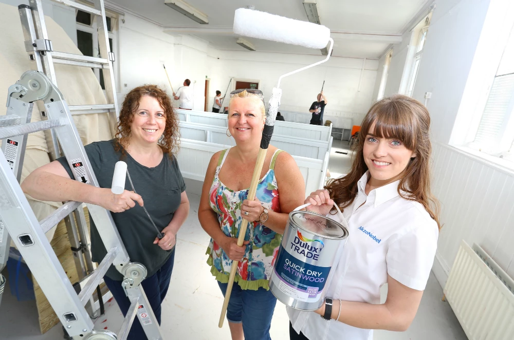 Fran Castle from Headway Arts, Maxine Gardner from Business in the Community and Alex Wardle from AkzoNobel at Headway Arts in Blyth.