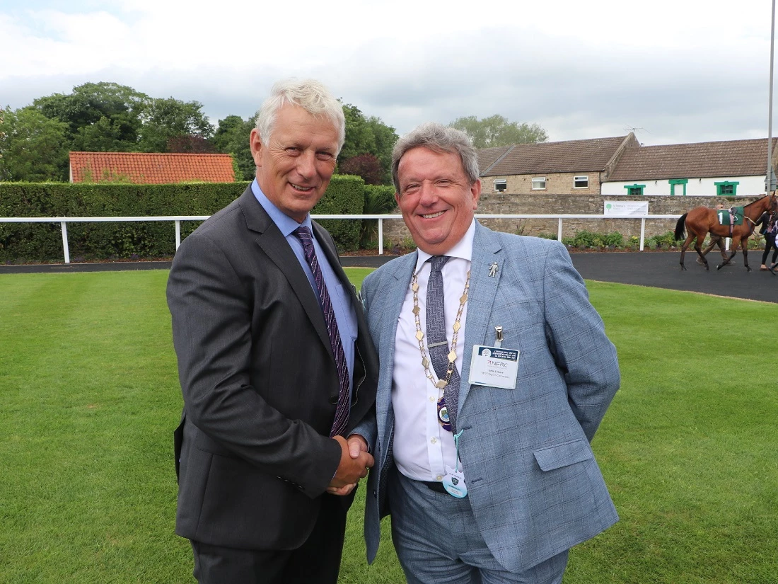 Martin-Brooks' John Elmore (right) accepts chairmanship of regional NFRC from predecessor, Gerald Parker. 