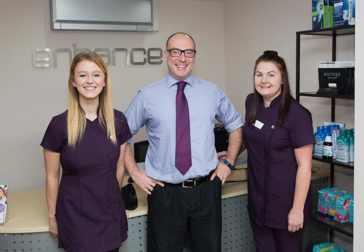 New Trainee Dental Nurse Rachel Hinley with Managing Director, Peter Farrage, and Senior Dental Nurse Laura Latimer