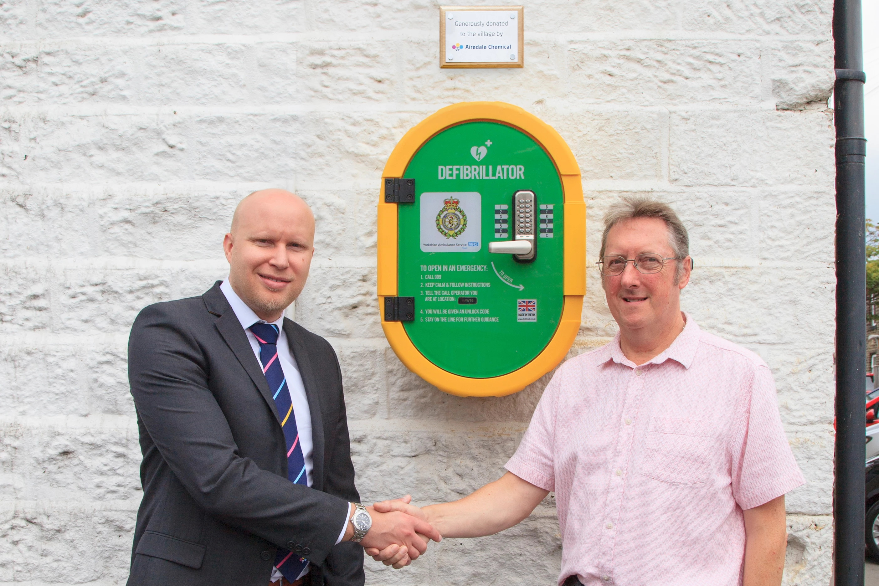 Airedale Chemical's Daniel Marr with Ian Gibson, vice president of Glusburn and Cross Hills parish council