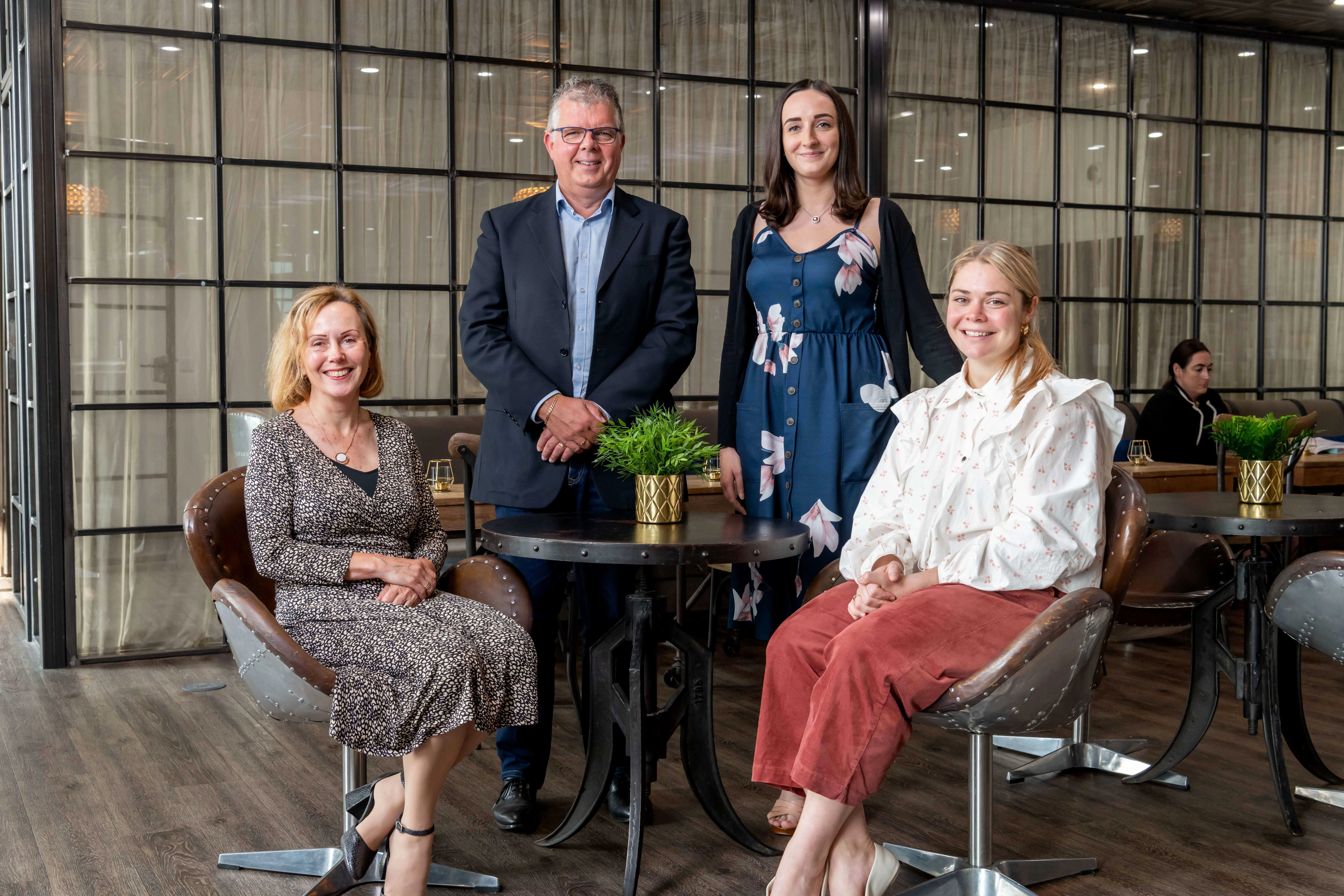 L-r: Sheila Murtagh, Chief Executive, and David Warburton-Broadhurst, Chair of Directors of Salford Credit Union, Danielle Brown, Director of Operations at IN4 Group and Bella Copland, Director of Programmes at HOST.