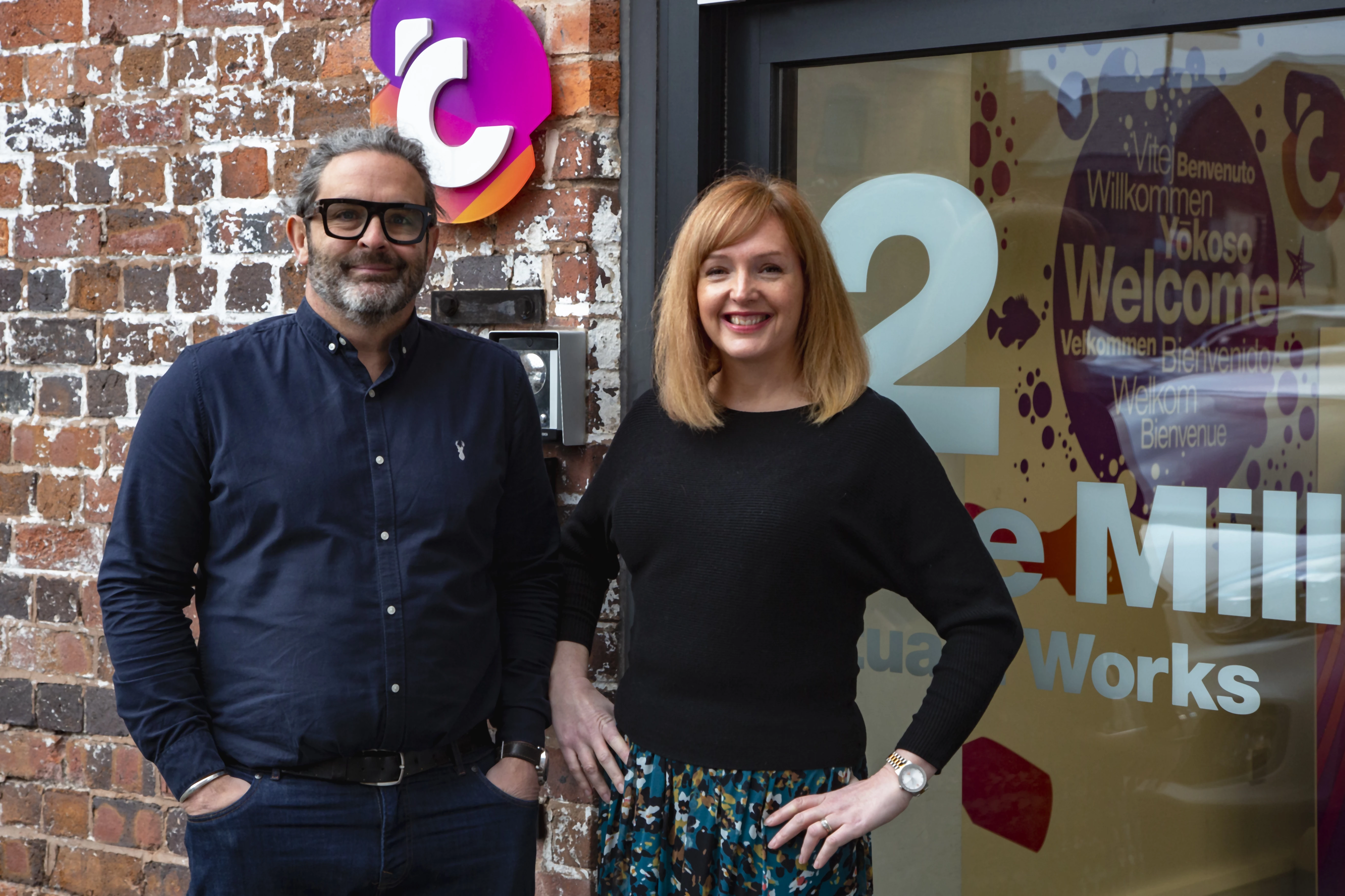 Simon and Fran Grigg outside the Think Studio Creative office in Stuart Works, Stourbridge