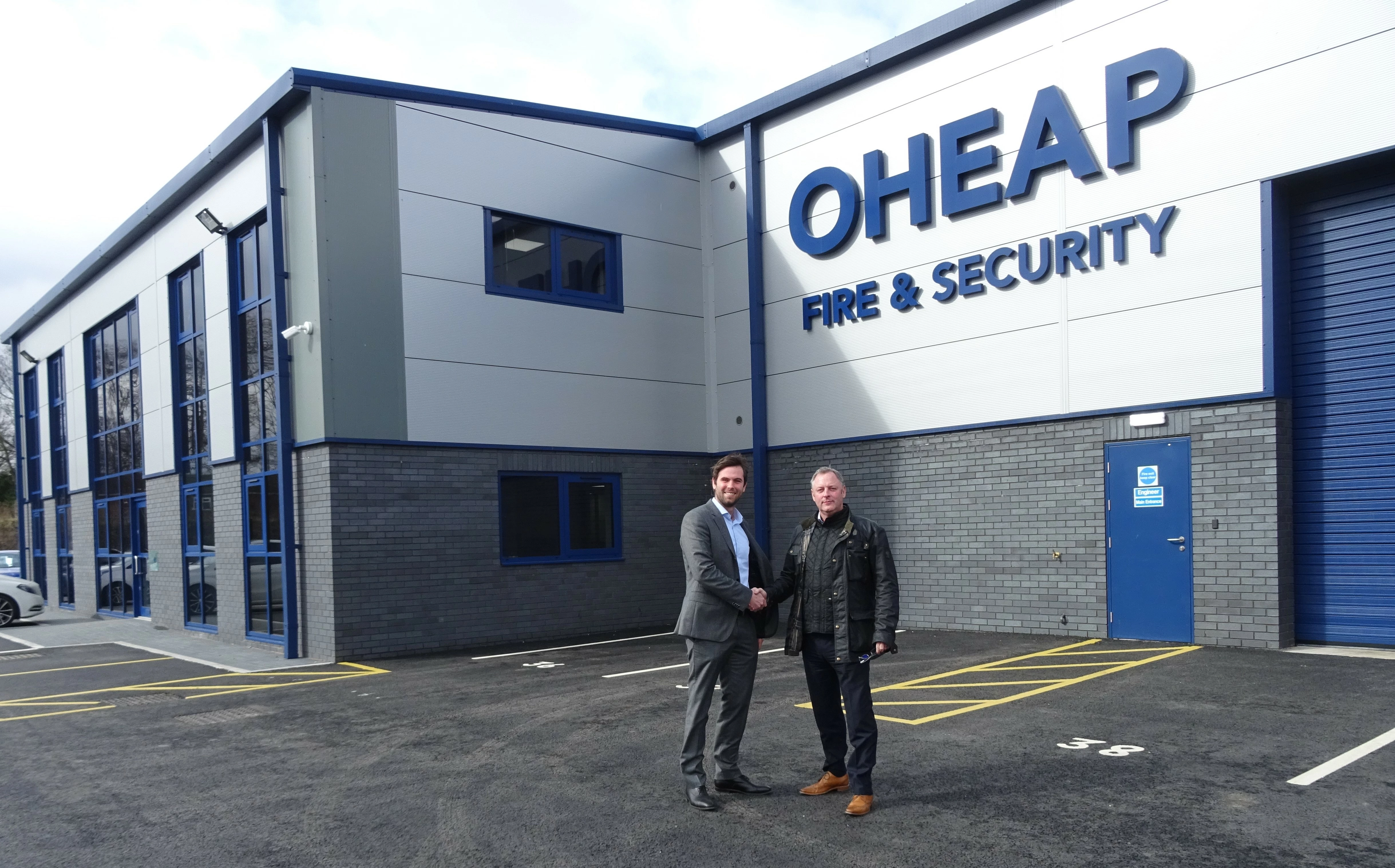 Director of Armsons Jonathan Heath, pictured with MD of O.Heap Nicholas Heap, outside the new headquarters