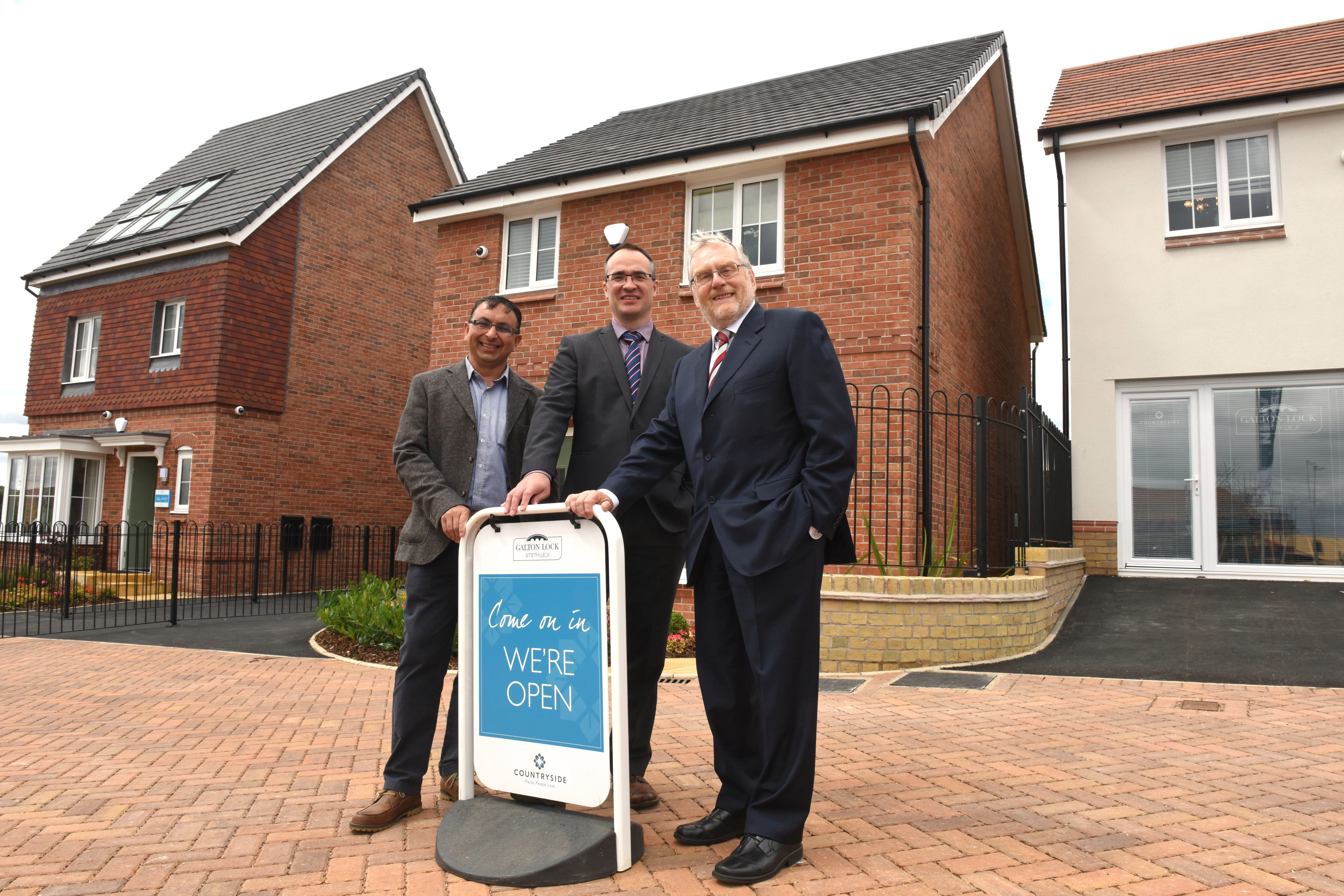 L-R Cllr Ahmed, John Gilbert (Regional Operations Director Countryside), John Spellar MP