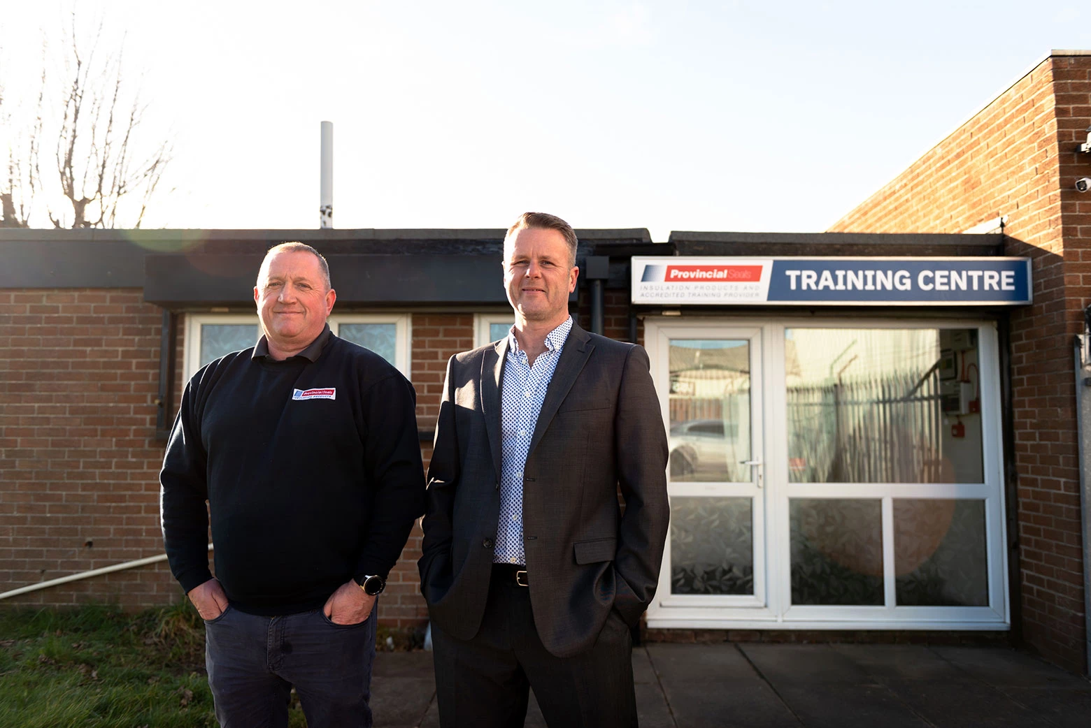 Bobby (left, Technical Trainer) and Kevin, (right, Head of Group Training) outside the newly refurbished training facility. 