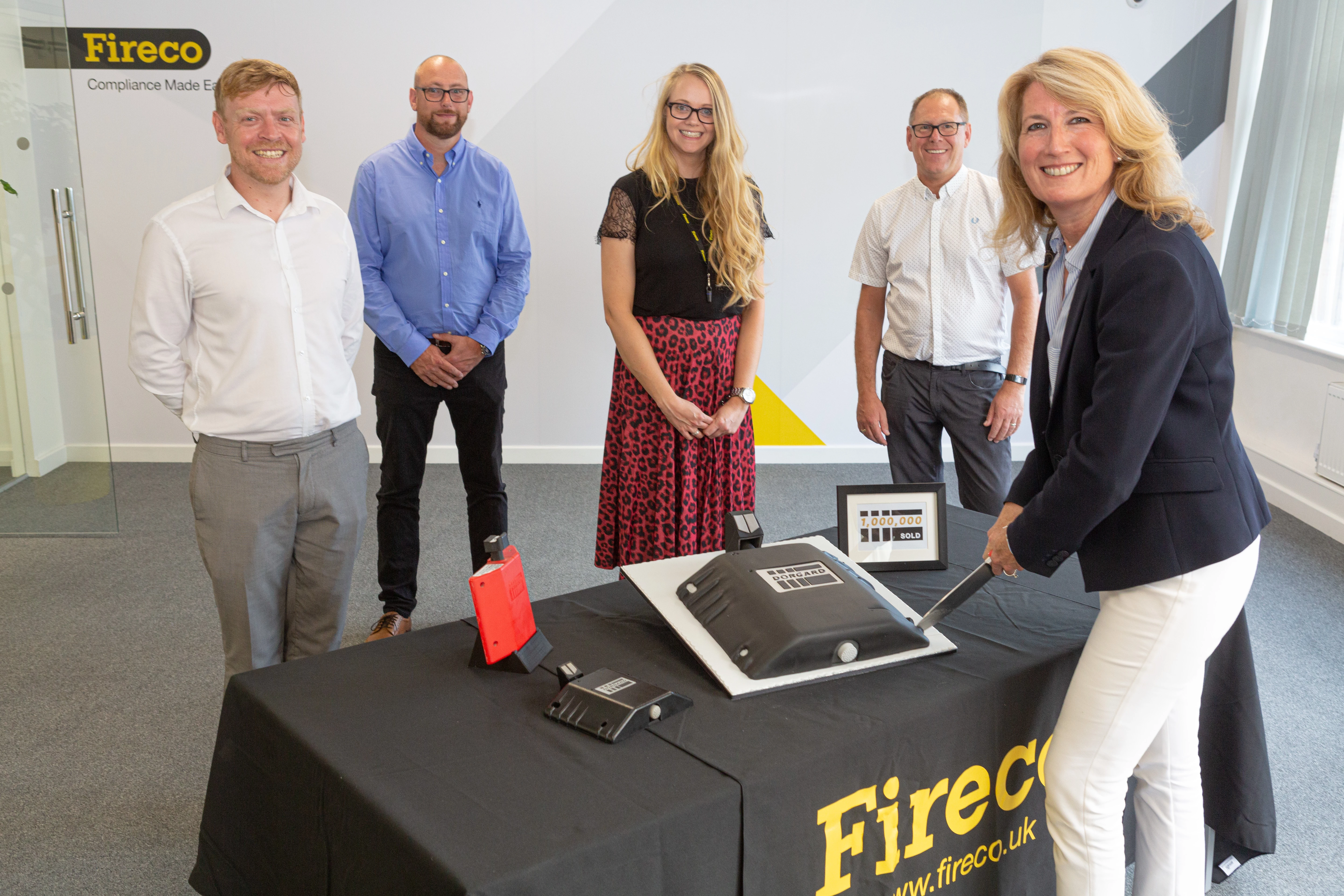 Fireco celebrates its millionth Dorgard sale - L-R - Alex Babbage, James Wheeler, Helen Elligate, Wayne Ellett, Michelle Bussey