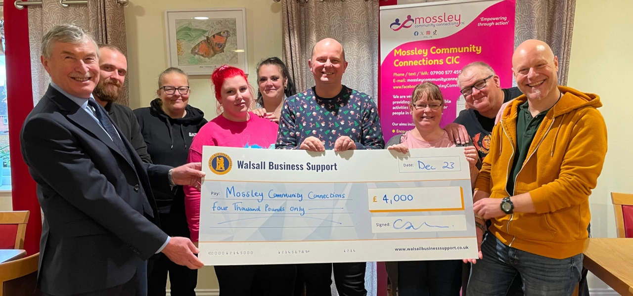 John Murray (far left) with Mossley Community Connections chair Sarah Roberts (third right), director Alex Vann (far right) and British Sign Language session attendees