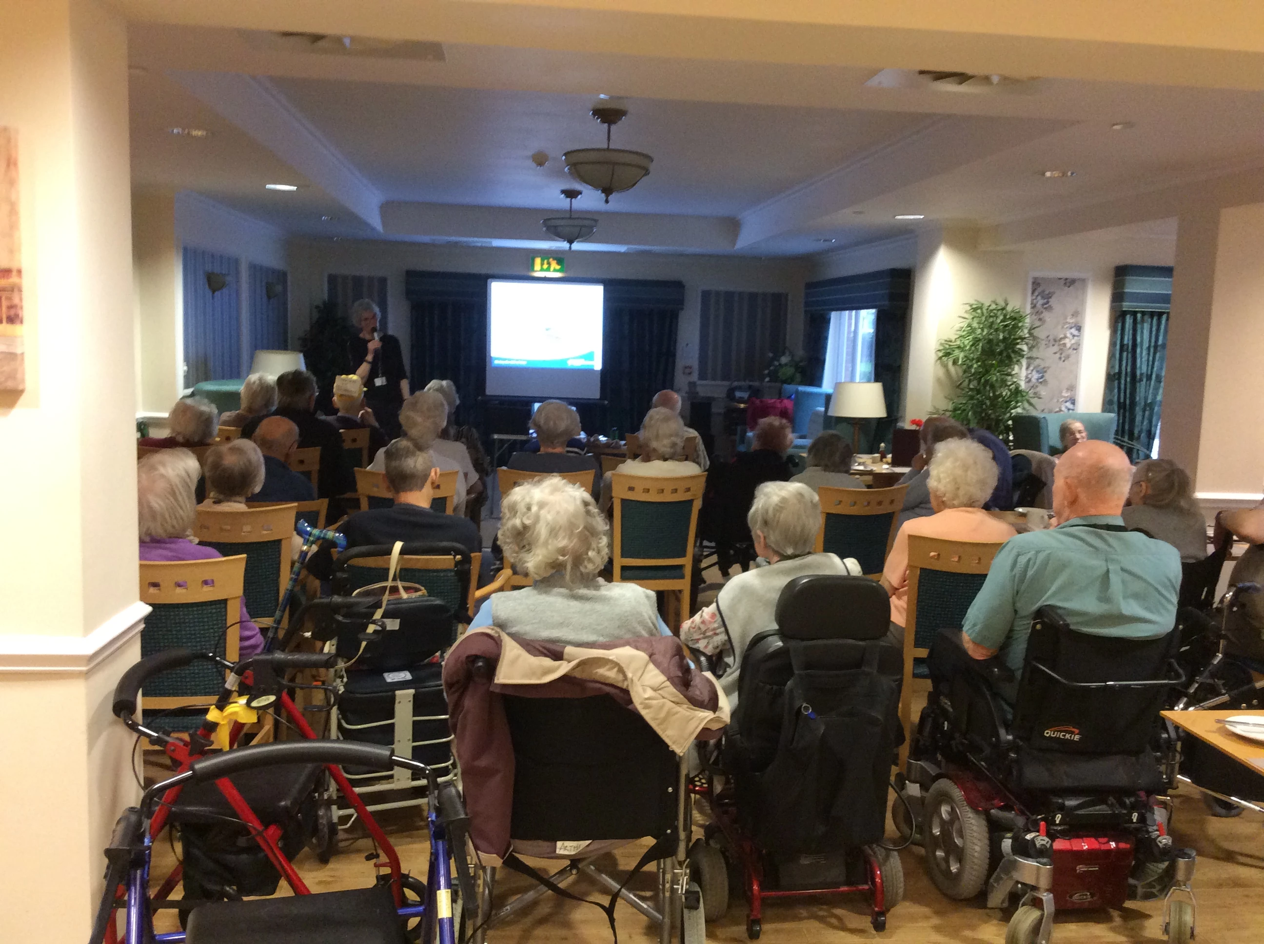 Residents from The Grange and The Lodge enjoying a visit from the North West Air Ambulance service