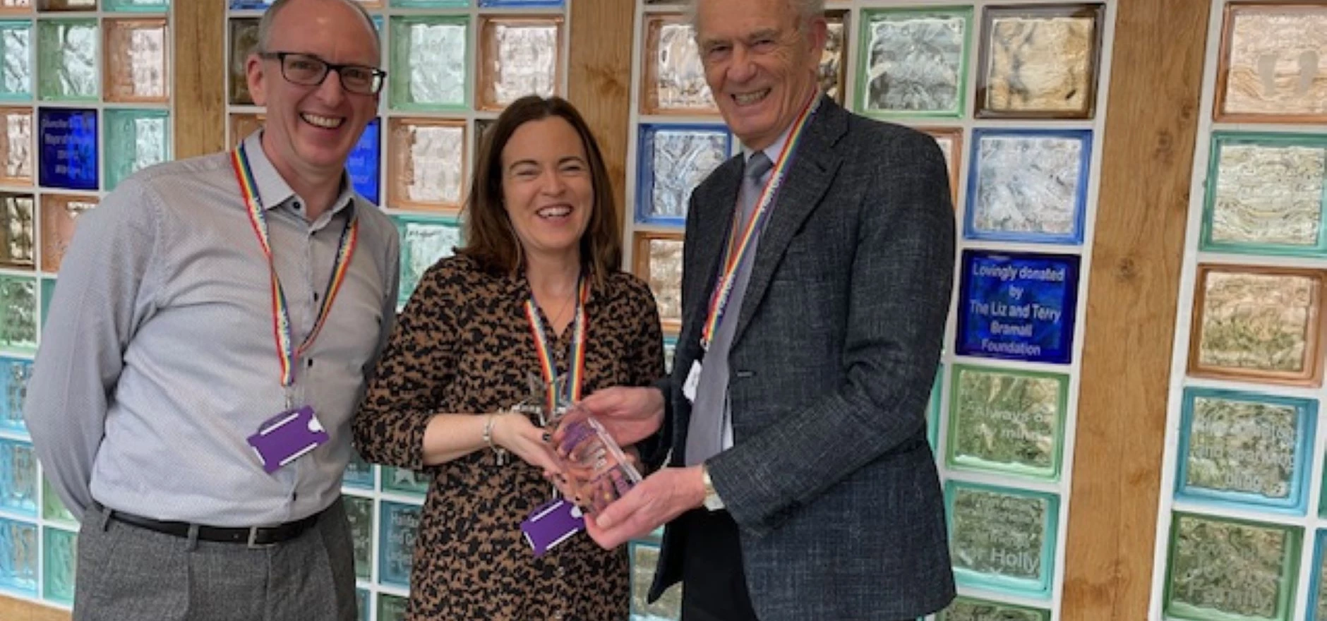 Ken Davy, right, Forget Me Not Children's Hospice presents a Platinum Partner Plaque to Colette Watts and Alec Jackson, Core Facility Services Limited resized.jpg