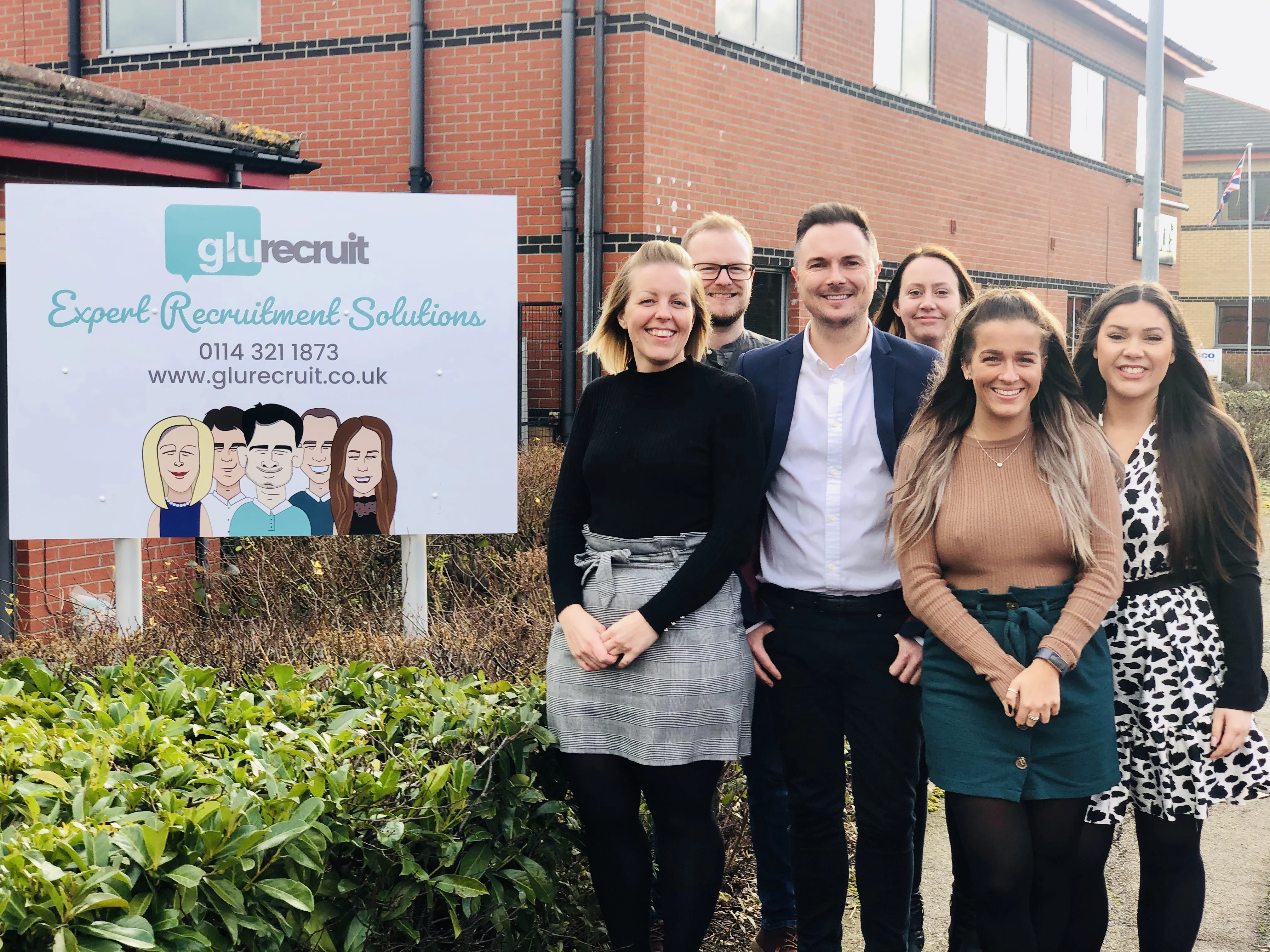 ‘The Glu Recruit team (with MD, Rob Shaw central) outside their new office on Bradmarsh Business Park in Rotherham’