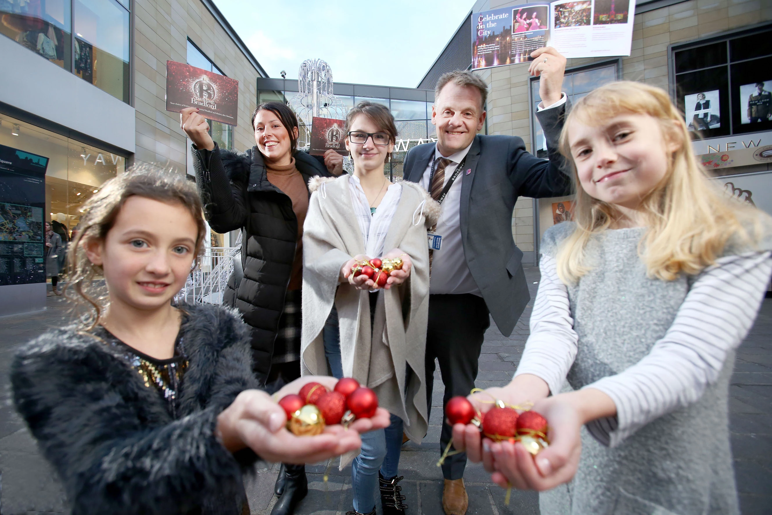 (L to R, back row) Diana Greenwood from Visit Bradford, Ian Ward from The Broadway with poem performers, (L to R, front row) Charlotte Malin, Georgina Macdonald, Jessica Braddy. 