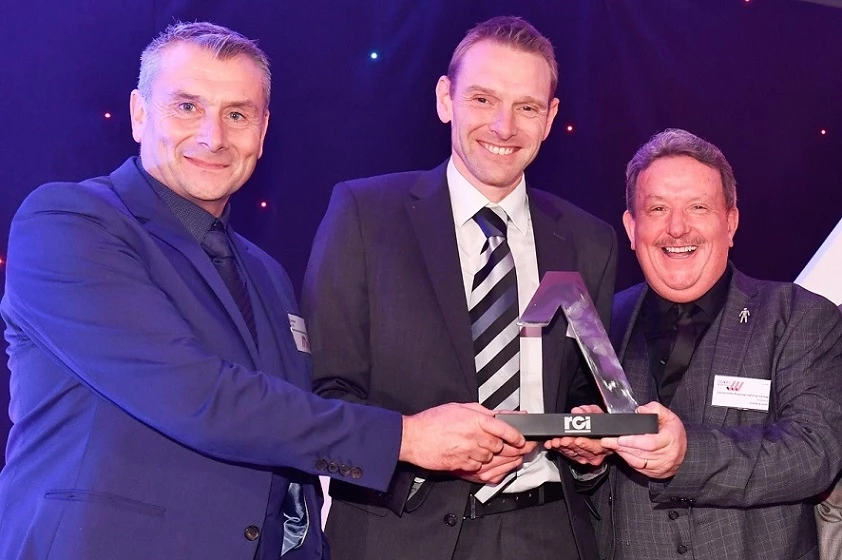 Left to right: Martin-Brooks directors, Dale Wright, Nick Brooks and John Elmore celebrate their double success at the Pitched Roofing Awards. 