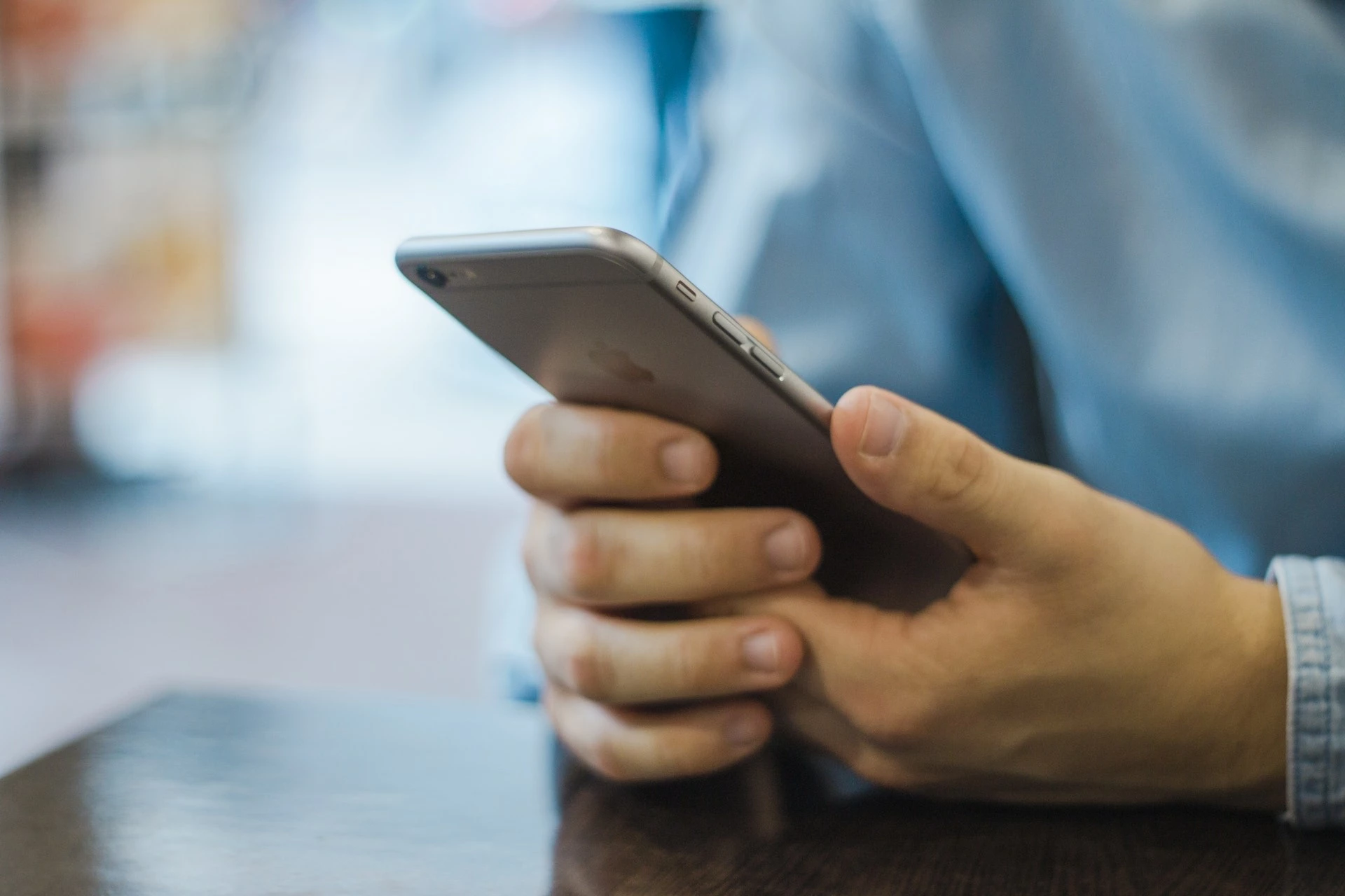 Man using smartphone.