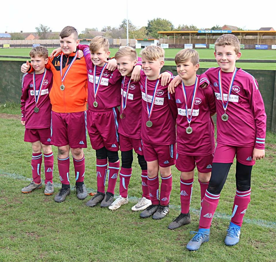 Members of the year five and six football team at Coddington Church of England Primary School.