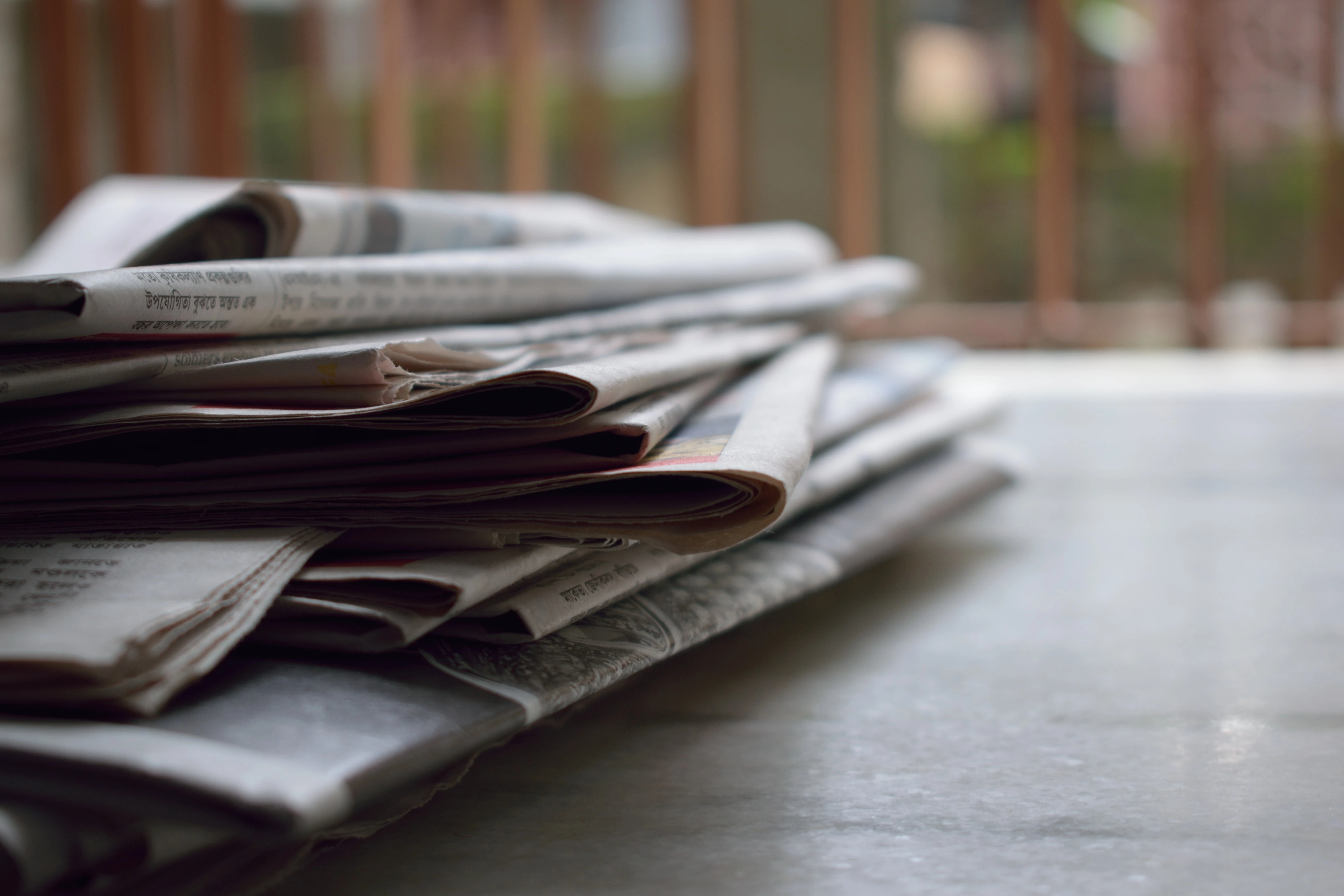 Pile or sheaf of newspapers. 