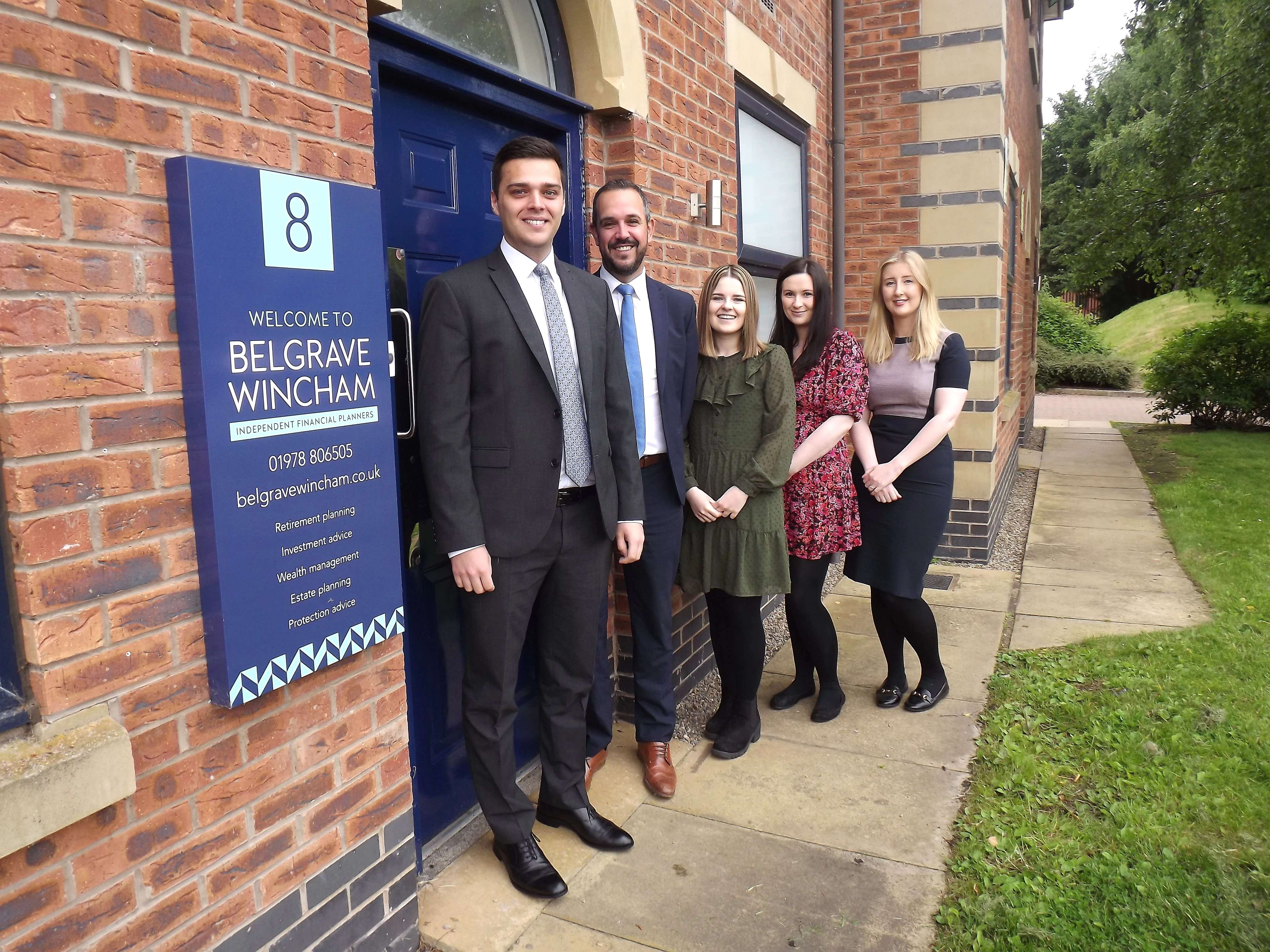 The team at Belgrave Wincham outside their new office