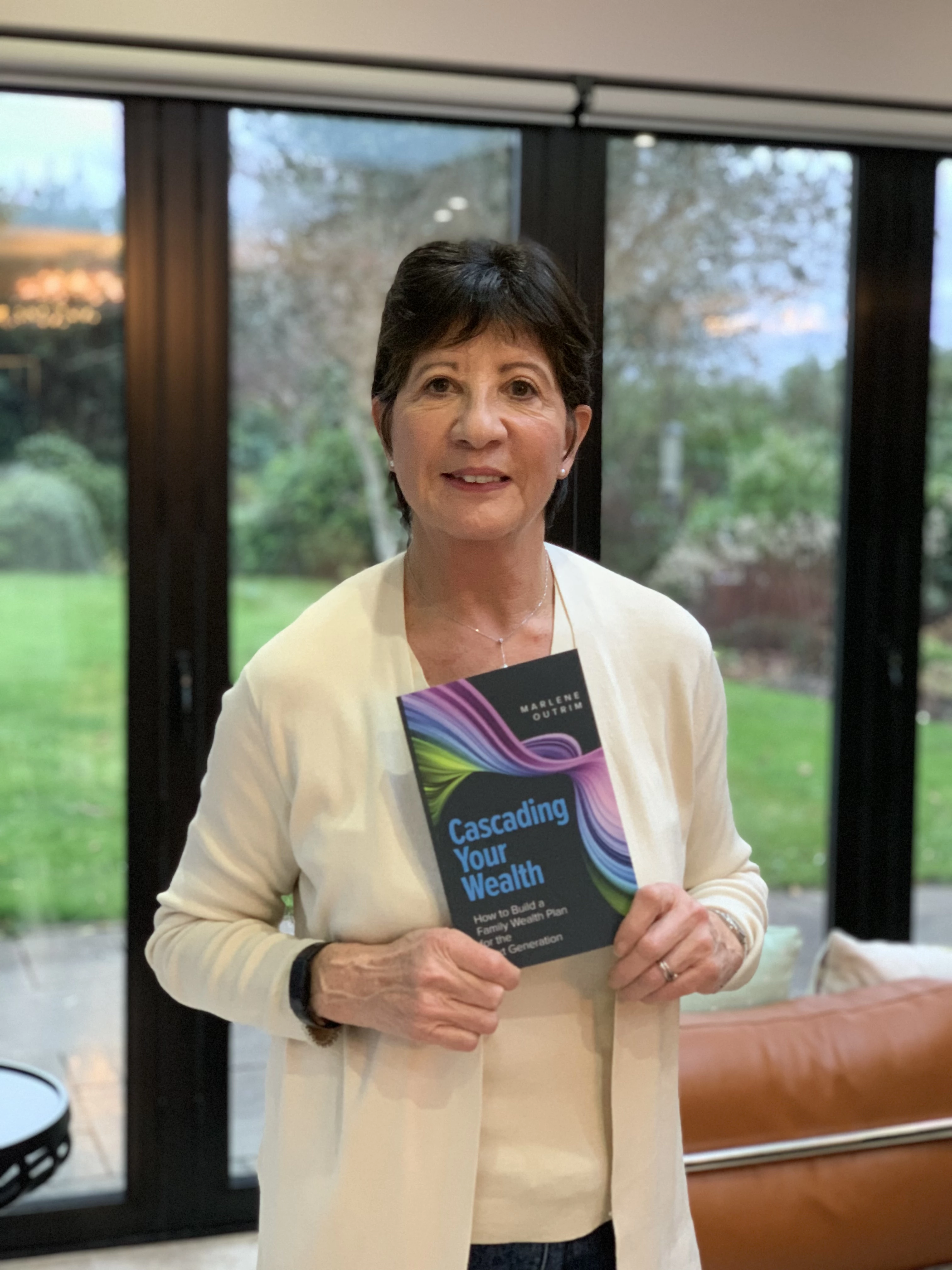 Marlene Outrim with her book