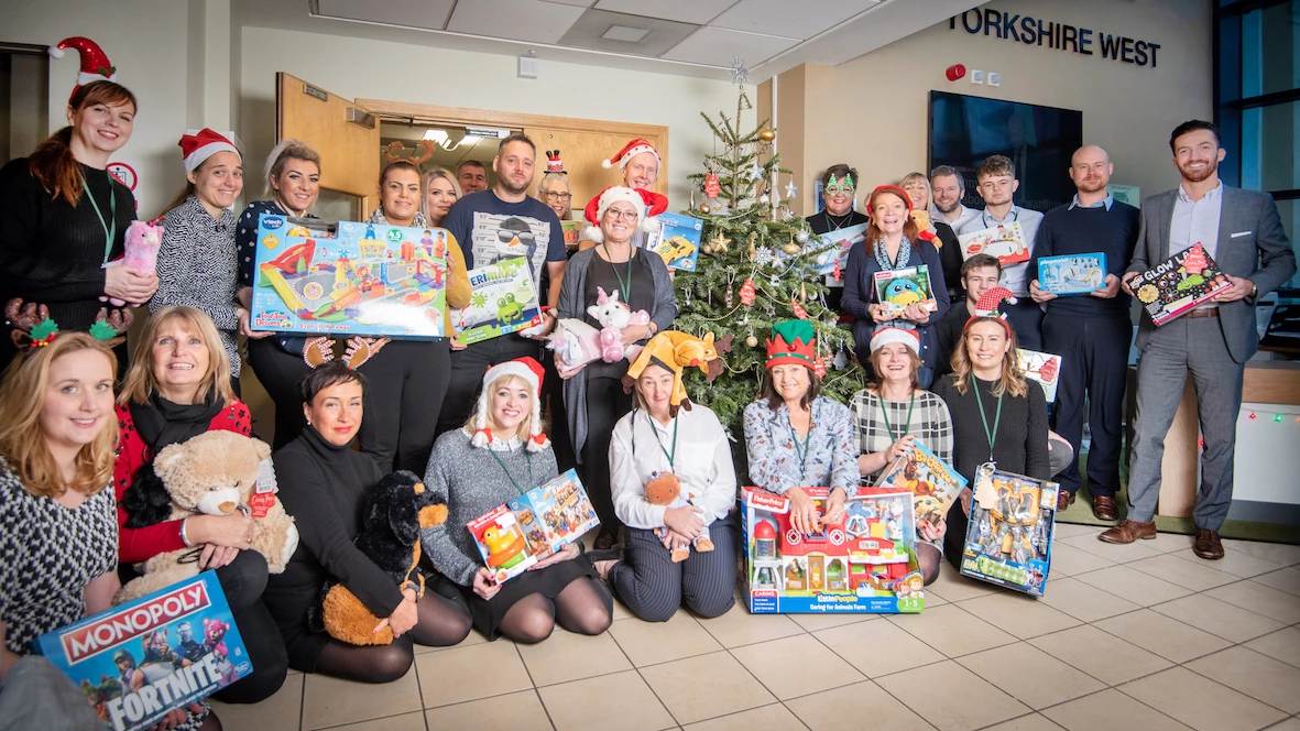 Staff from Barratt Developments Yorkshire West with the KidsOut Giving Tree