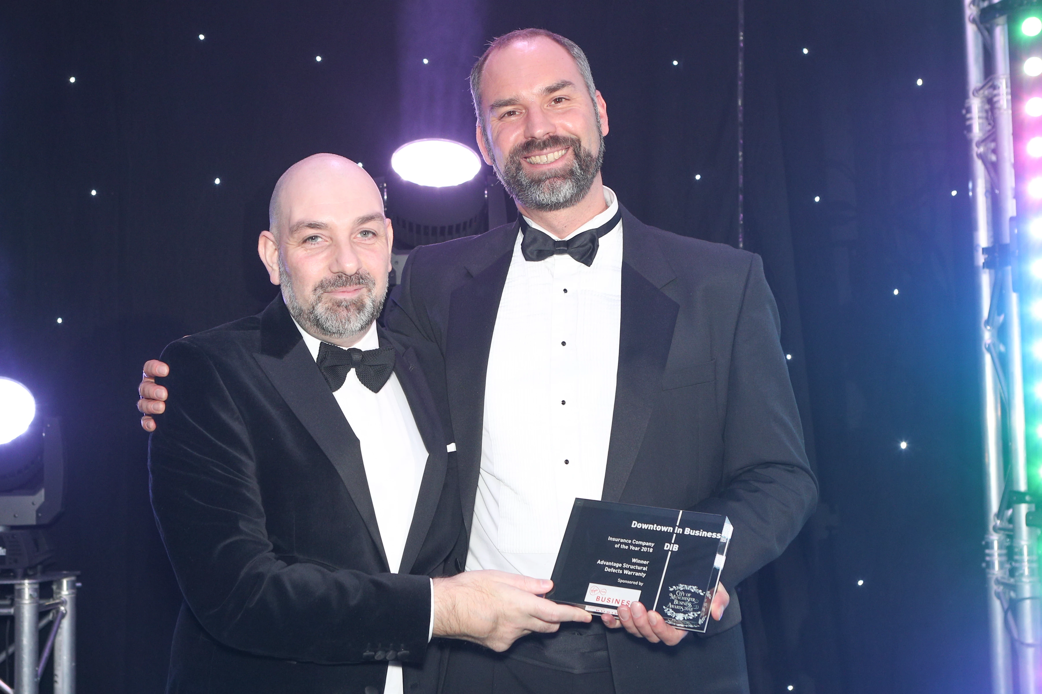  Pictured: James Topping of Advantage Insurance & John Duncan of Virgin Media Business.