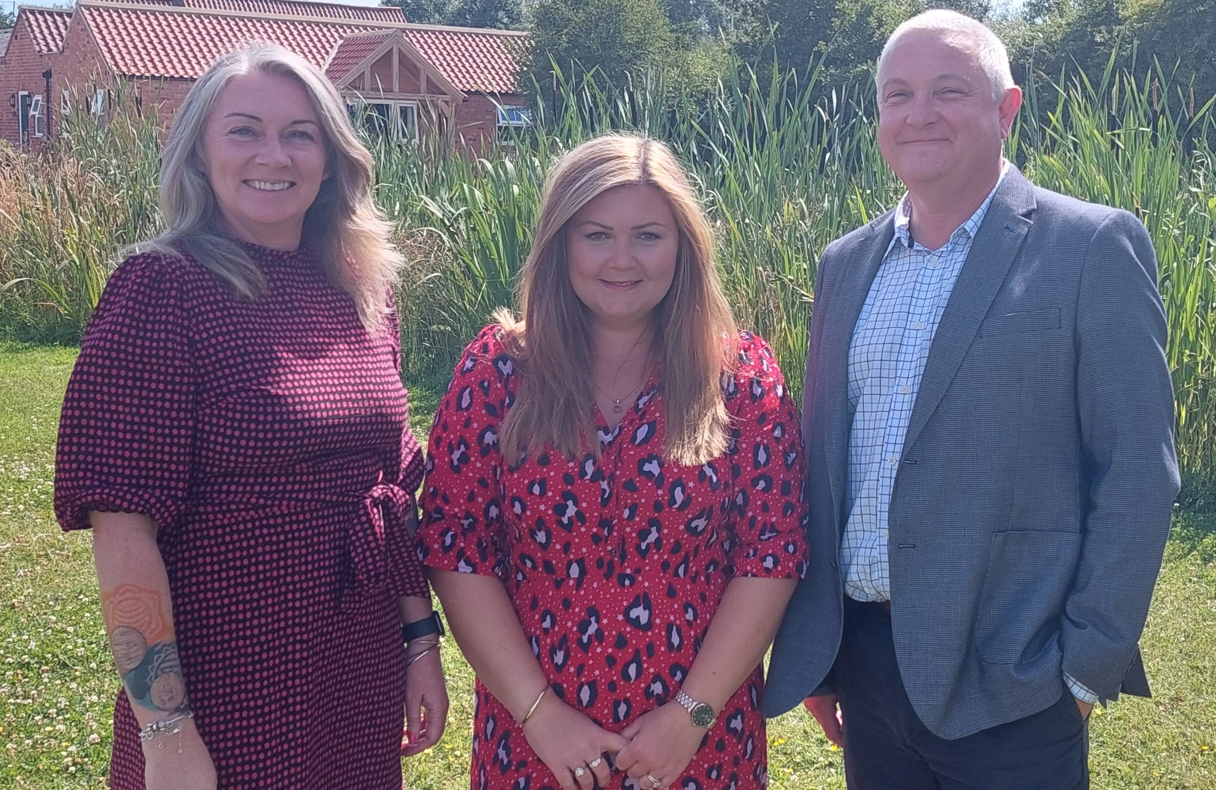 Group managing director Andrew Mackenzie welcomes Rachel back to the business with One Stop Invoice Finance managing director, Lynn-Marie Jameson.