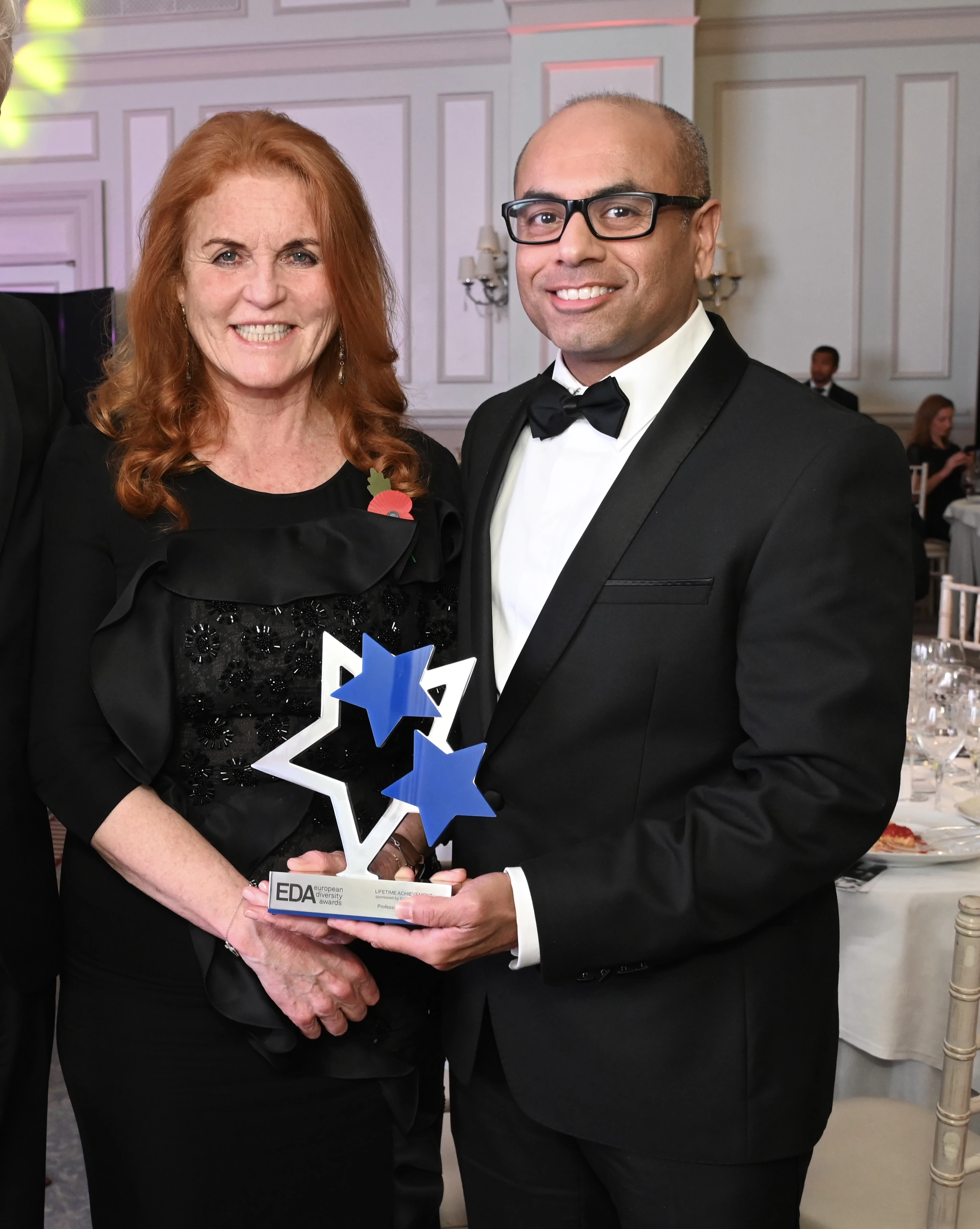 Professor Frank Joseph holding his European Diversity Award alongside the Duchess of York Sarah Ferguson