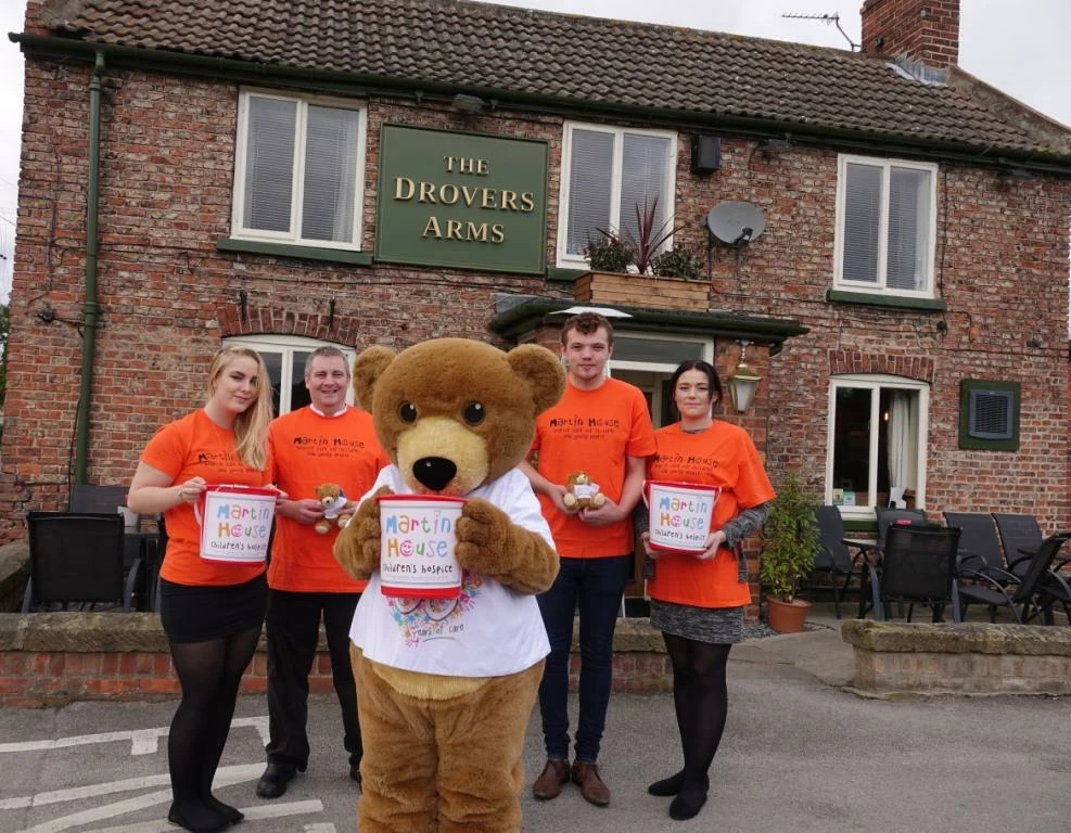 Pictured with Martin House mascot Marty Bear are head chef Shane White, front of house manager Adam Atkinson, assistant front of house manager Hollie Winter and team member Tanya Cooper