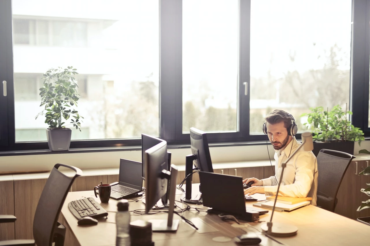 Man in headset working